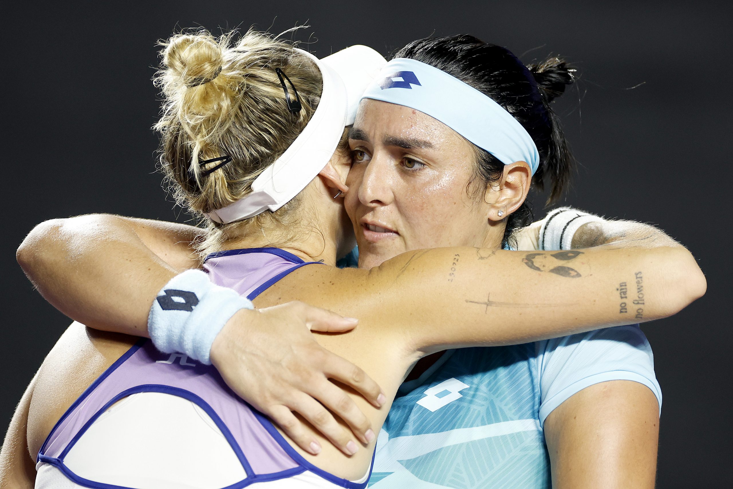 Marketa Vondrousova congratulates Ons Jabeur.