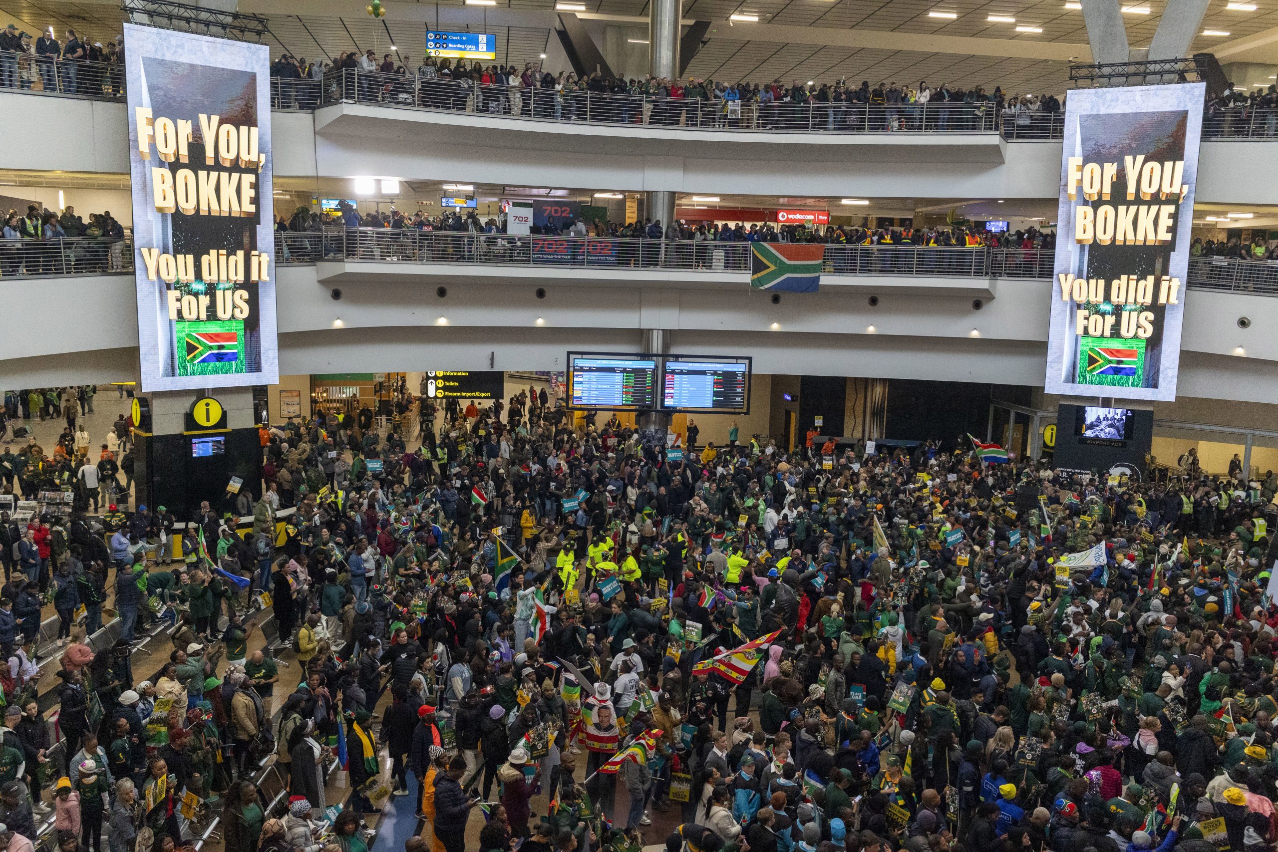 Fans wait for the Springboks to arrive at OR Tambo International Airport.