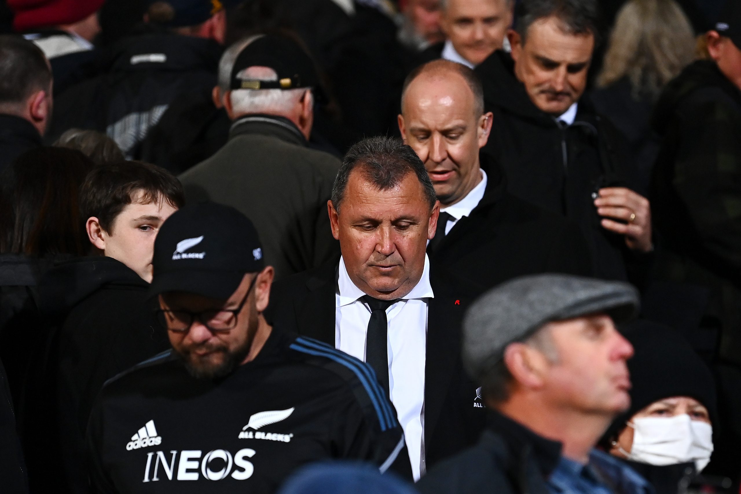 All Blacks coach Ian Foster walks through the crowd.