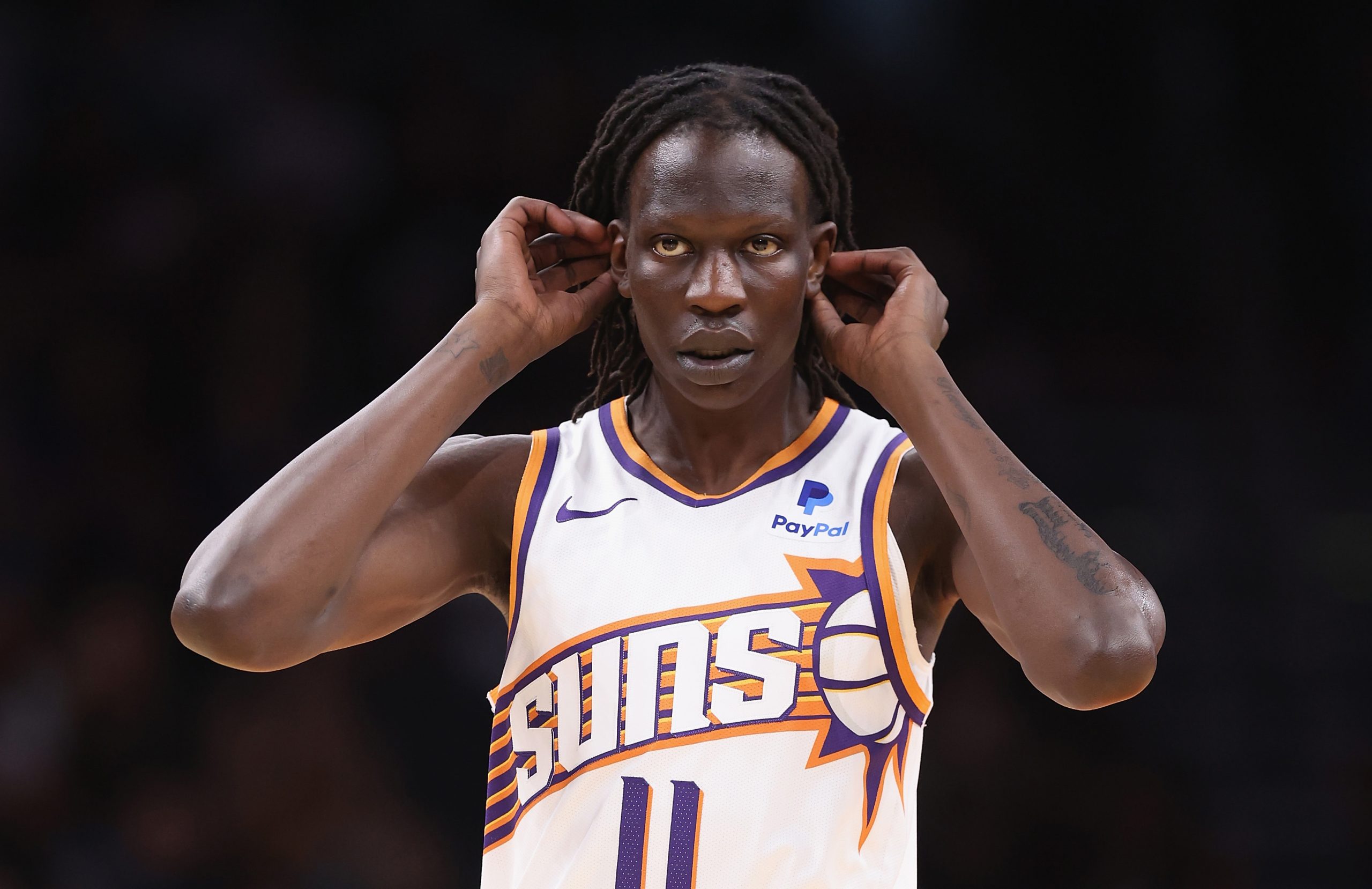 PHOENIX, ARIZONA - OCTOBER 10: Bol Bol #11 of the Phoenix Suns checks into the second half of the NBA game against the Denver Nuggets at Footprint Center on October 10, 2023 in Phoenix, Arizona. 