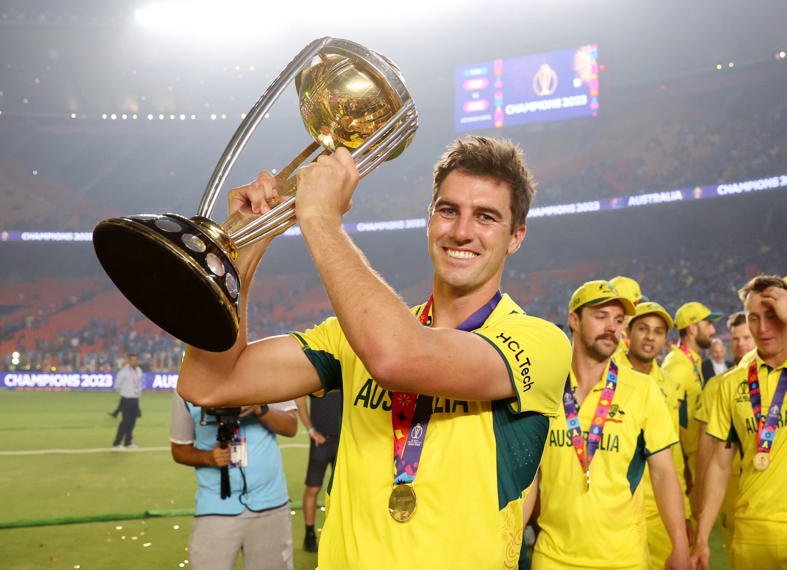 Australian skipper Pat Cummins hoists the World Cup trophy.