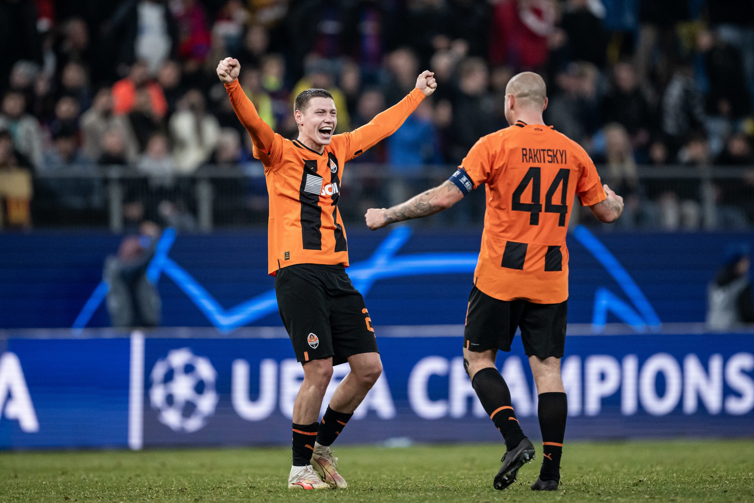 Mykola Matvienko and Yaroslav Rakitskyi of Shakhtar Donetsk celebrate victory.