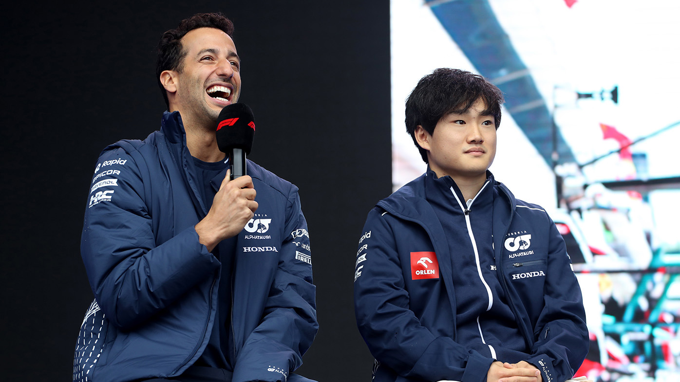 Daniel Ricciardo of Australia and Scuderia AlphaTauri and Yuki Tsunoda of Japan and Scuderia AlphaTauri talk to the crowd on the fan stage prior to practice ahead of the F1 Grand Prix of Belgium at Circuit de Spa-Francorchamps on July 28, 2023 in Spa, Belgium. (Photo by Peter Fox/Getty Images)