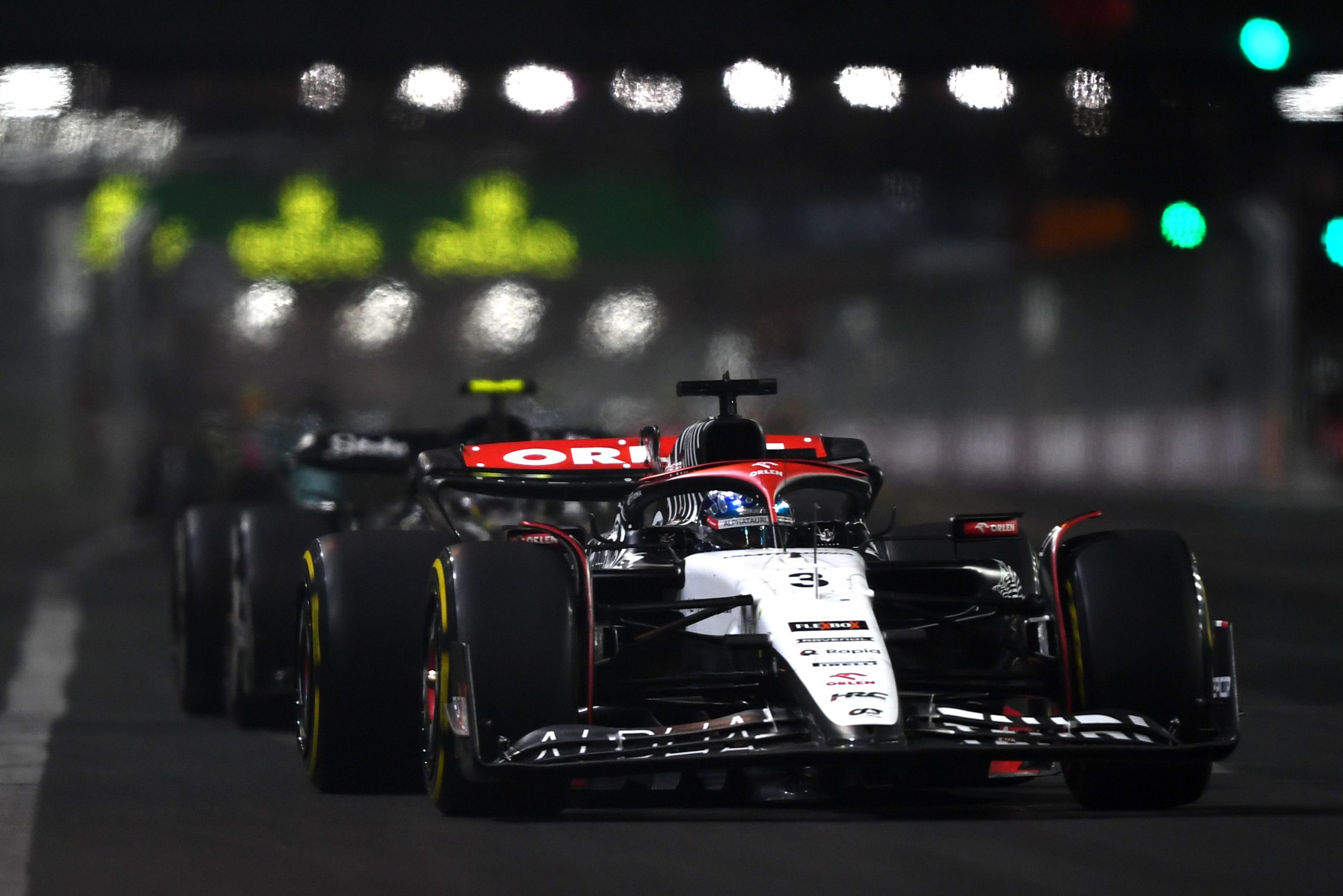 Daniel Ricciardo of Australia driving the (3) Scuderia AlphaTauri AT04 on track during the F1 Grand Prix of Las Vegas at Las Vegas Strip Circuit on November 18, 2023 in Las Vegas, Nevada. (Photo by Rudy Carezzevoli/Getty Images)