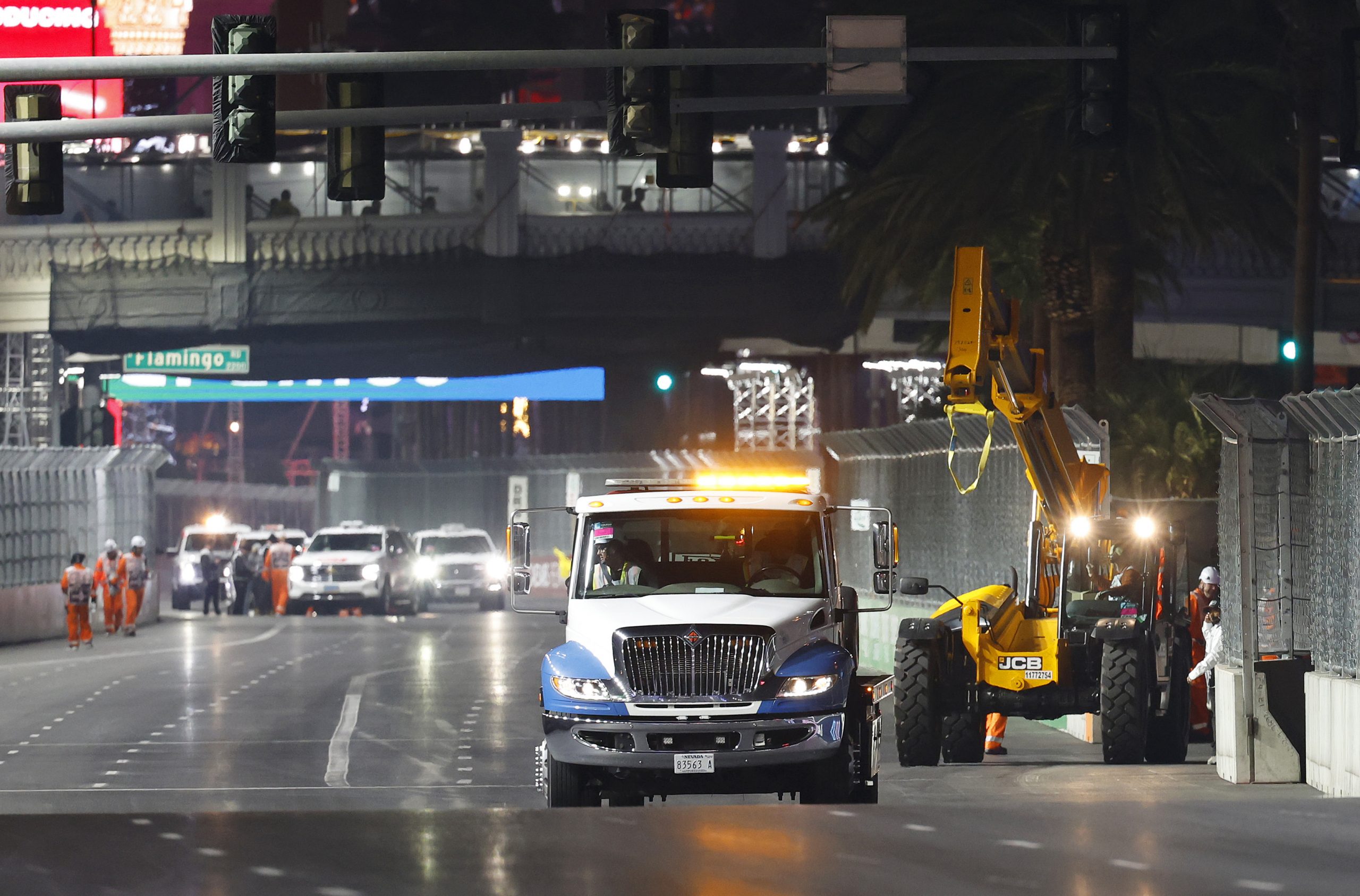 LAS VEGAS, NEVADA - NOVEMBER 16: The car of Carlos Sainz of Spain and Ferrari is removed from the circuit after stopping on track during practice ahead of the F1 Grand Prix of Las Vegas at Las Vegas Strip Circuit on November 16, 2023 in Las Vegas, Nevada. (Photo by Chris Graythen/Getty Images