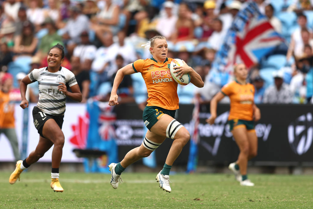 Maddison Levi of Australia makes a break before scoring a try during the 2023 Sydney Sevens.