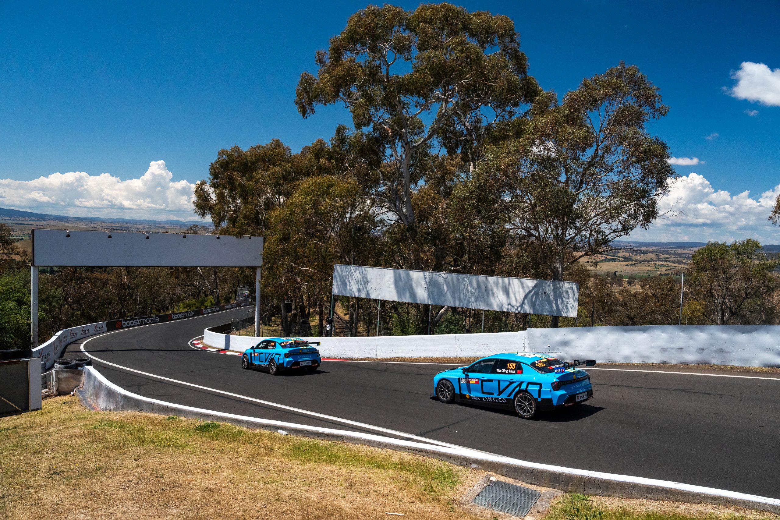 Ma Qing Hua exits the Dipper at Mount Panorama behind his Cyan Racing teammate.