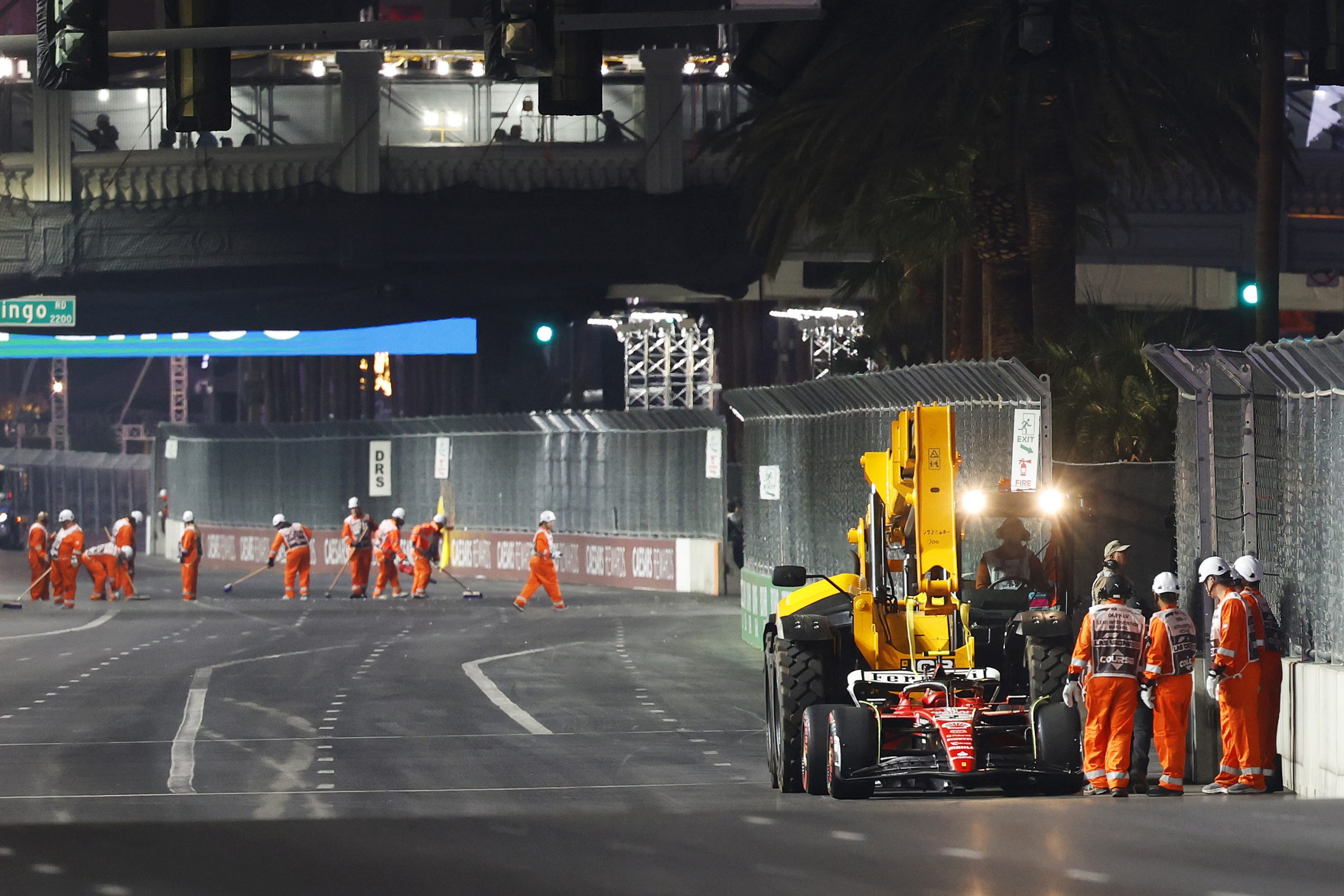 LAS VEGAS, NEVADA - NOVEMBER 16: The car of Carlos Sainz of Spain and Ferrari is removed from the circuit after stopping on track during practice ahead of the F1 Grand Prix of Las Vegas at Las Vegas Strip Circuit on November 16, 2023 in Las Vegas, Nevada. (Photo by Chris Graythen/Getty Images