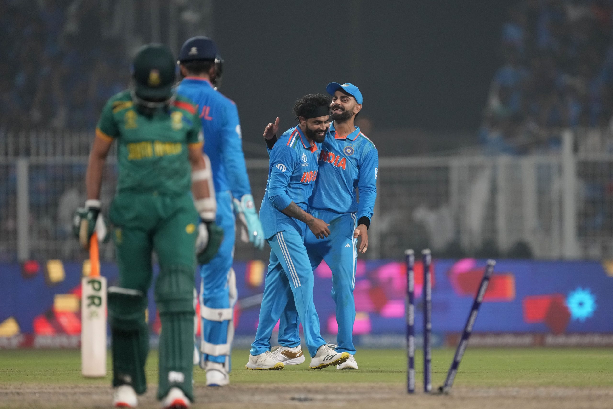 India's Ravindra Jadeja and Virat Kohli celebrates the wicket of South Africa's Keshav Maharaj.