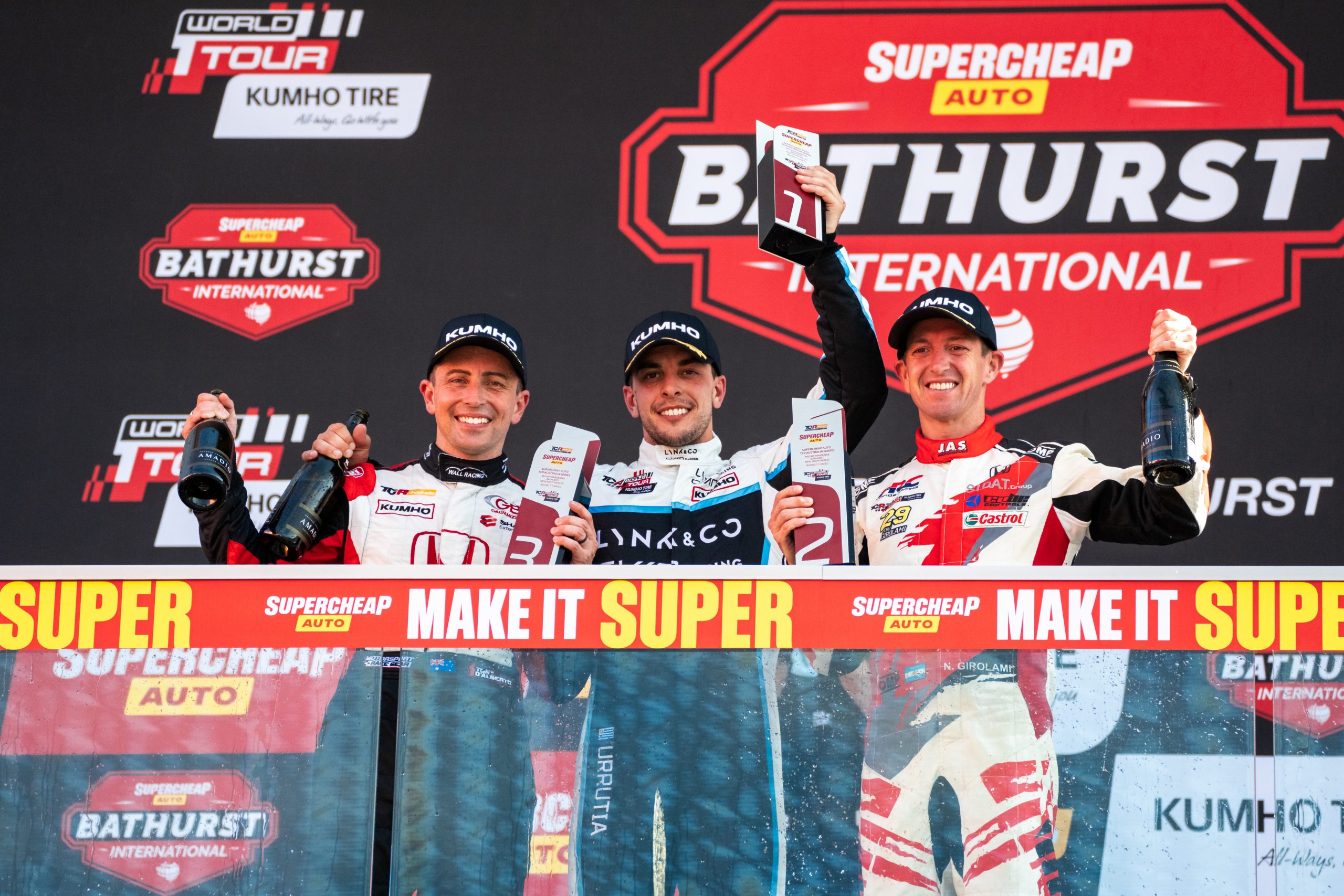 Tony D'Alberto (left), Santiago Urrutia (middle), and Nestor Girolami (right) on the Bathurst International podium.