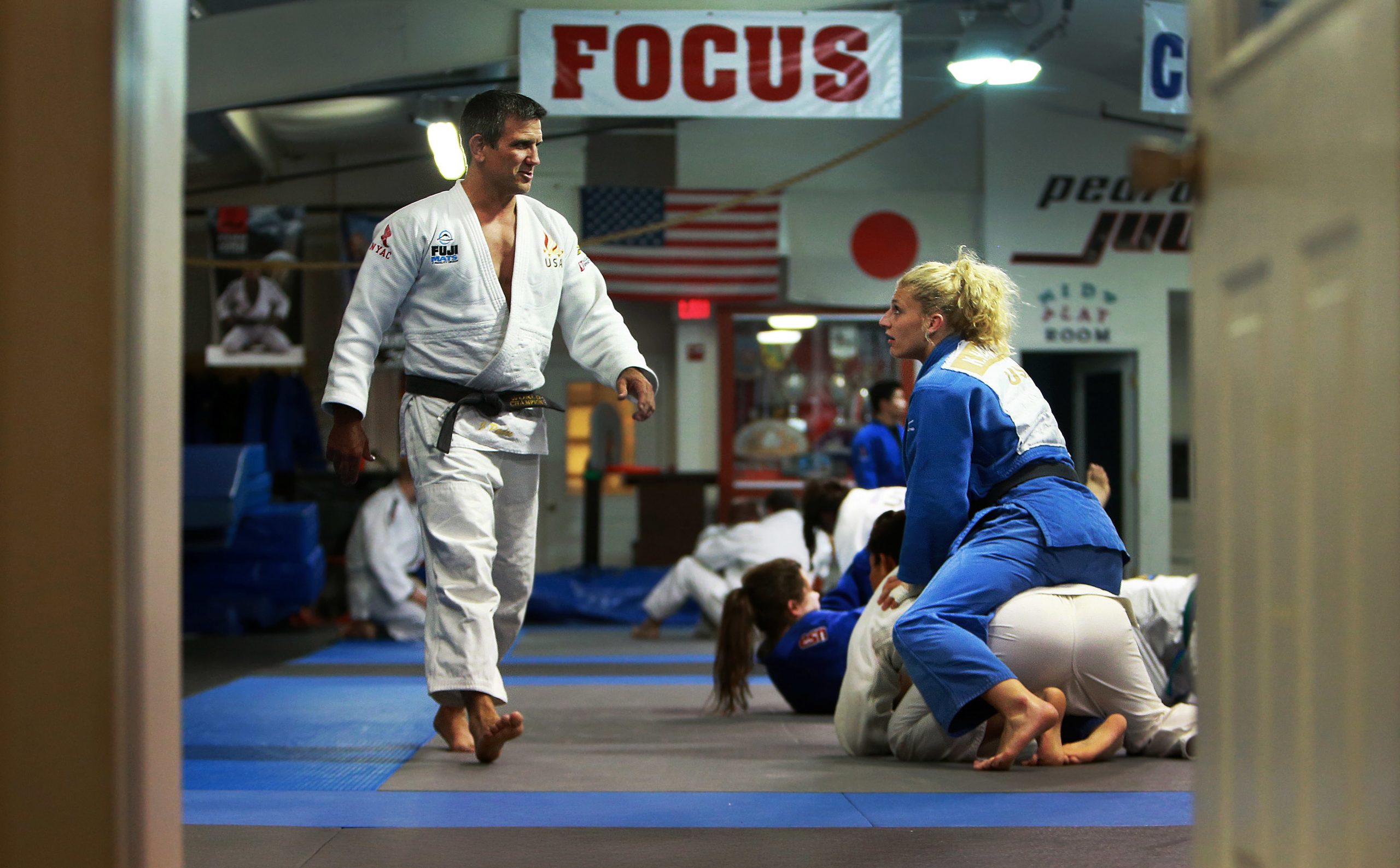 Kayla Harrison works out at Pedro's Judo with her coach Jimmy Pedro in 2016.