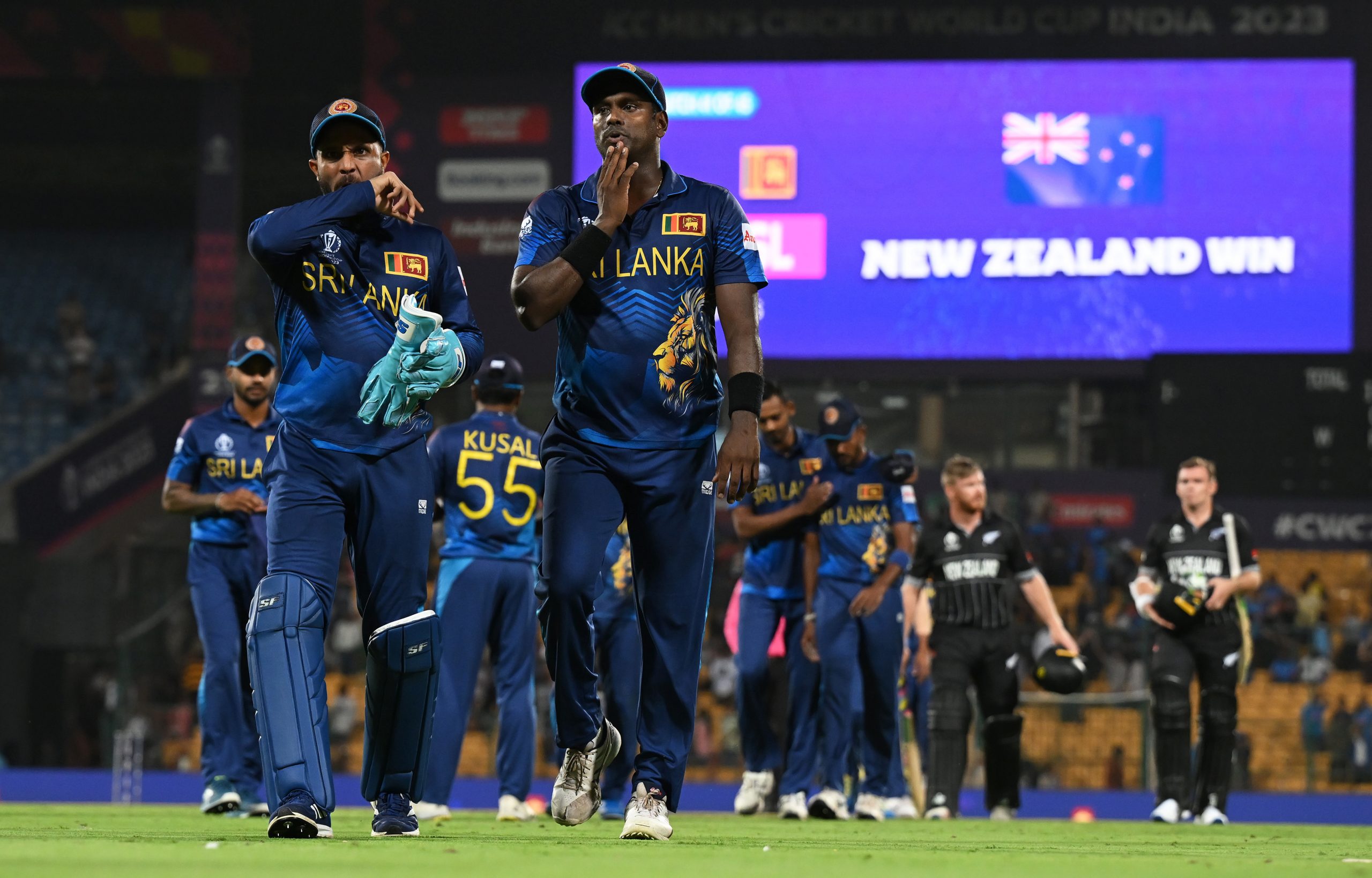 BANGALORE, INDIA - NOVEMBER 09: Kusal Mendis and Angelo Matthews of Sri Lanka make their way off following the ICC Men's Cricket World Cup India 2023 between New Zealand and Sri Lanka at M. Chinnaswamy Stadium on November 09, 2023 in Bangalore, India. (Photo by Matt Roberts-ICC/ICC via Getty Images)