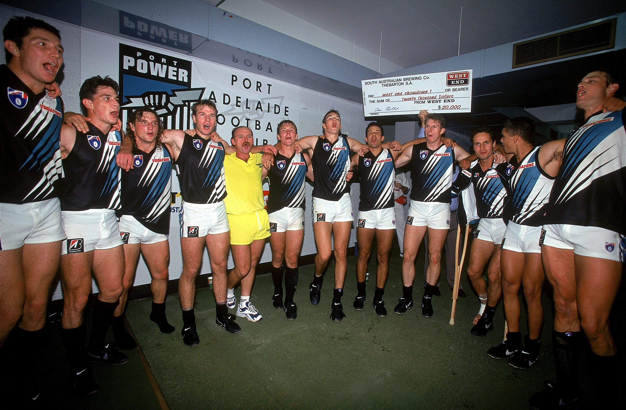 ADELAIDE, AUSTRALIA - APRIL 20:  Port Adelaide Power celebrate after the teams win during the round four AFL match between the Port Adelaide Power and the Adelaide Crows held at Football Park April 20, 1997 in Adelaide, Australia. This was the first match between the two South Australian teams. (Photo by Sean Garnsworthy/Getty Images)