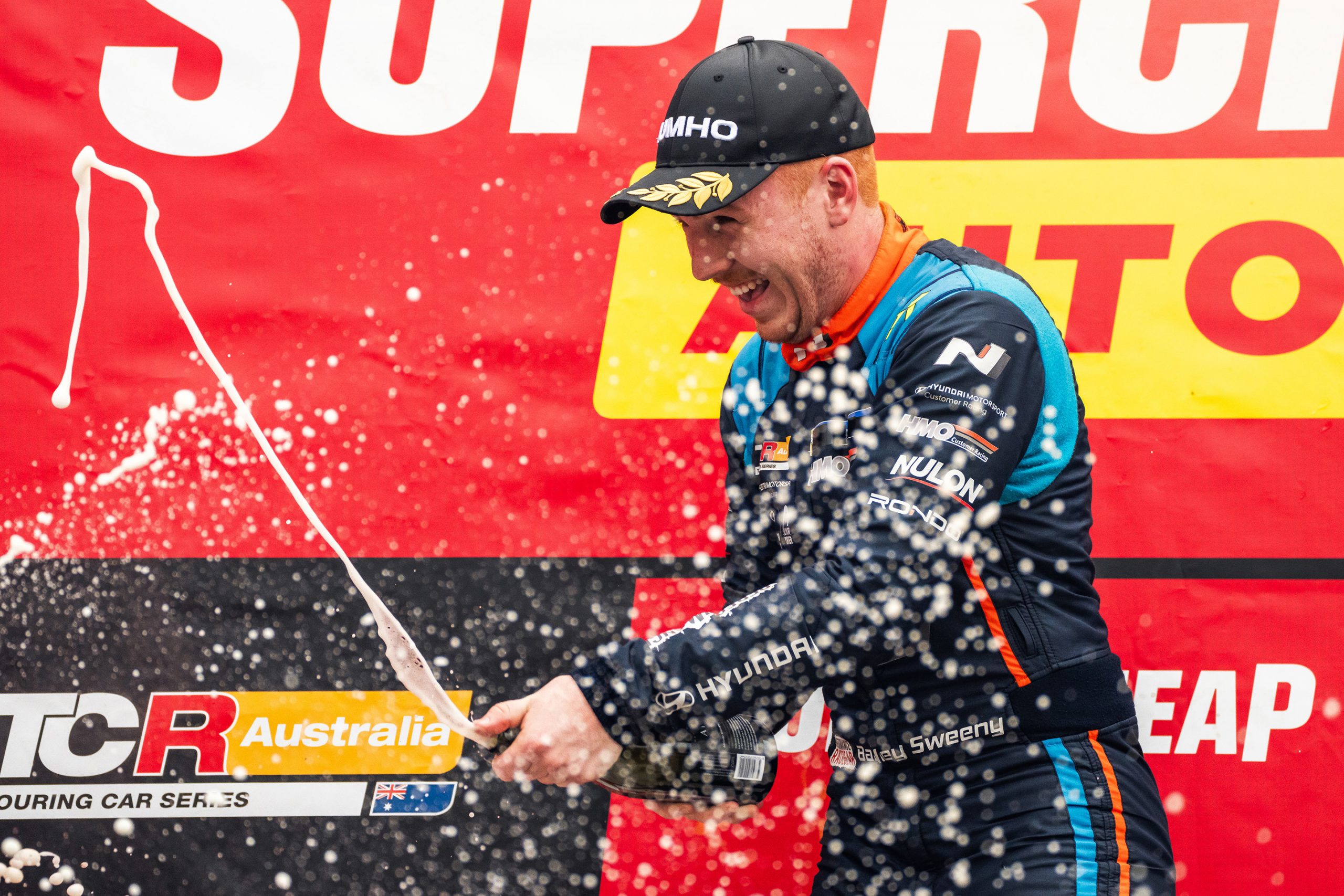 Bailey Sweeny celebrates a podium finish at Sandown.