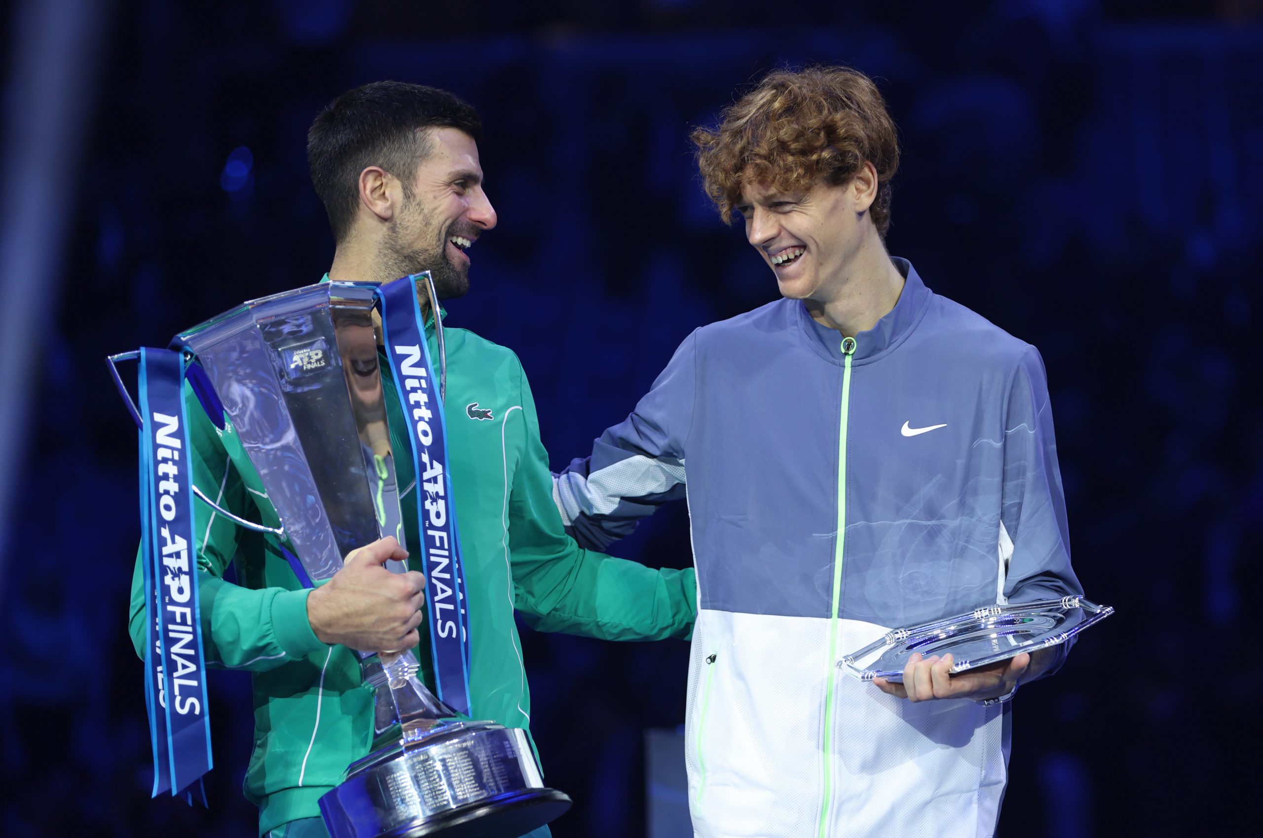 Novak Djokovic and Jannik Sinner of Italy during the trophy presentation at the ATP Finals.