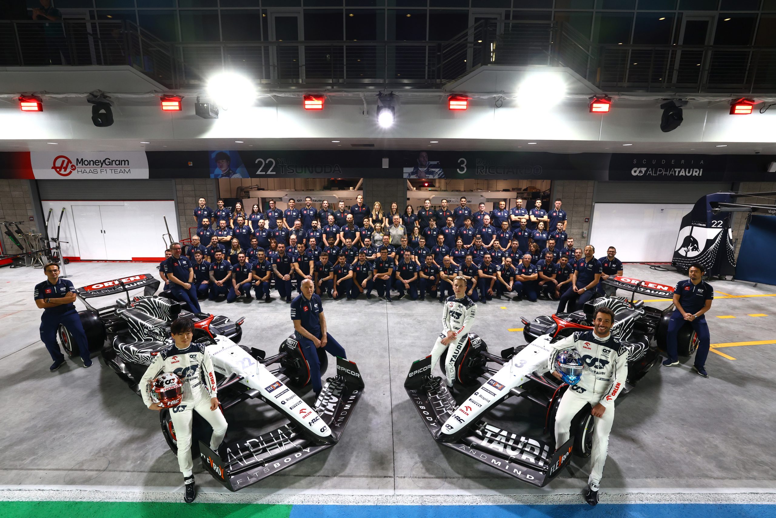 Scuderia AlphaTauri team members pose for a photo in the Pitlane prior to the F1 Grand Prix of Las Vegas at Las Vegas Strip Circuit on November 18, 2023 in Las Vegas, Nevada. (Photo by Rudy Carezzevoli/Getty Images)