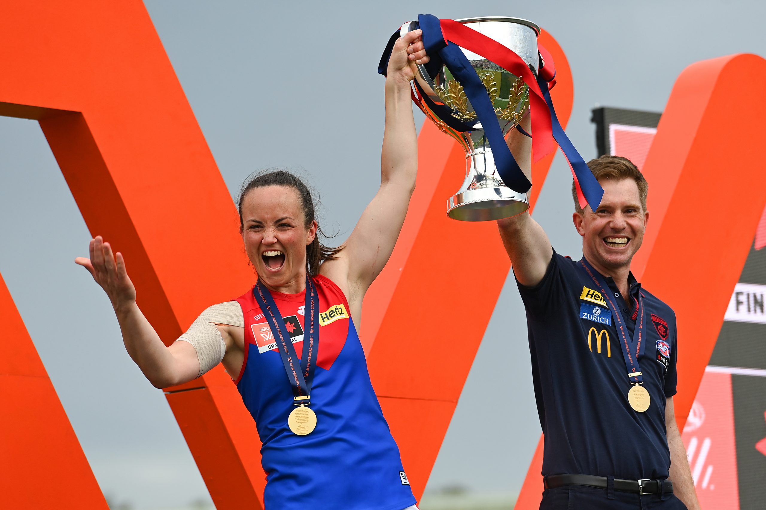 BRISBANE, AUSTRALIA - NOVEMBER 27: Melbourne Demons team captain Daisy Pearce calls the team to the podi during the AFLW Grand Final match between the Brisbane Lions and the Melbourne Demons at Brighton Homes Arena on November 27, 2022 in Brisbane, Australia. (Photo by Albert Perez/AFL Photos/Getty Images)