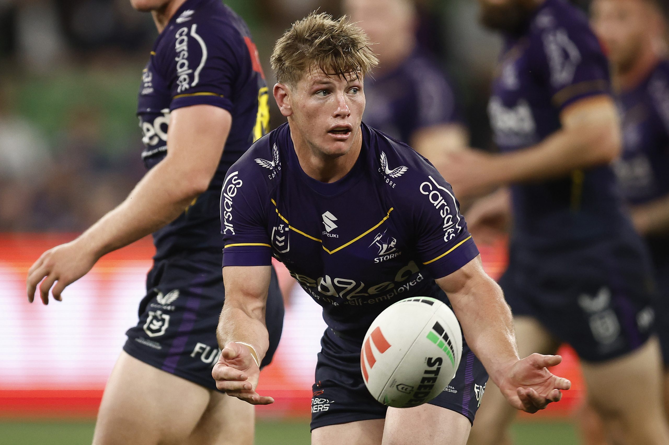 MELBOURNE, AUSTRALIA - SEPTEMBER 15: Harry Grant of the Storm passes the ball during the NRL Semi Final match between Melbourne Storm and the Sydney Roosters at AAMI Park on September 15, 2023 in Melbourne, Australia. (Photo by Daniel Pockett/Getty Images)