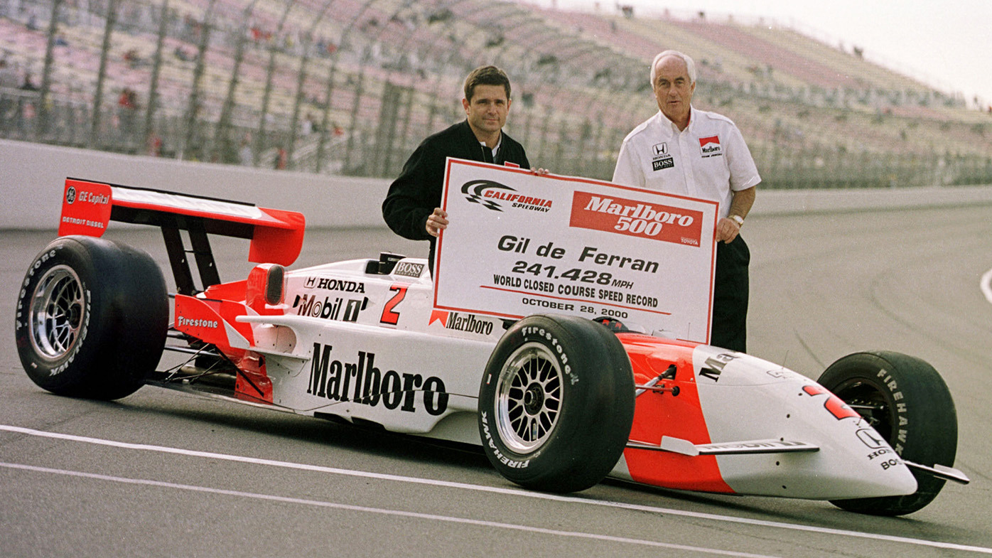 Gil de Ferran and Marlboro Team Penske team owner Roger Penske celebrate the fastest ever qualifying lap of 241.428 mph after qualifying on pole position at the Marlboro 500, round twenty of the C.A.R.T. (Championship Auto Racing Teams) FedEx Championship series at the California Speedway, Fontana, California Mandatory Credit: Robert Laberge/ALLSPORT