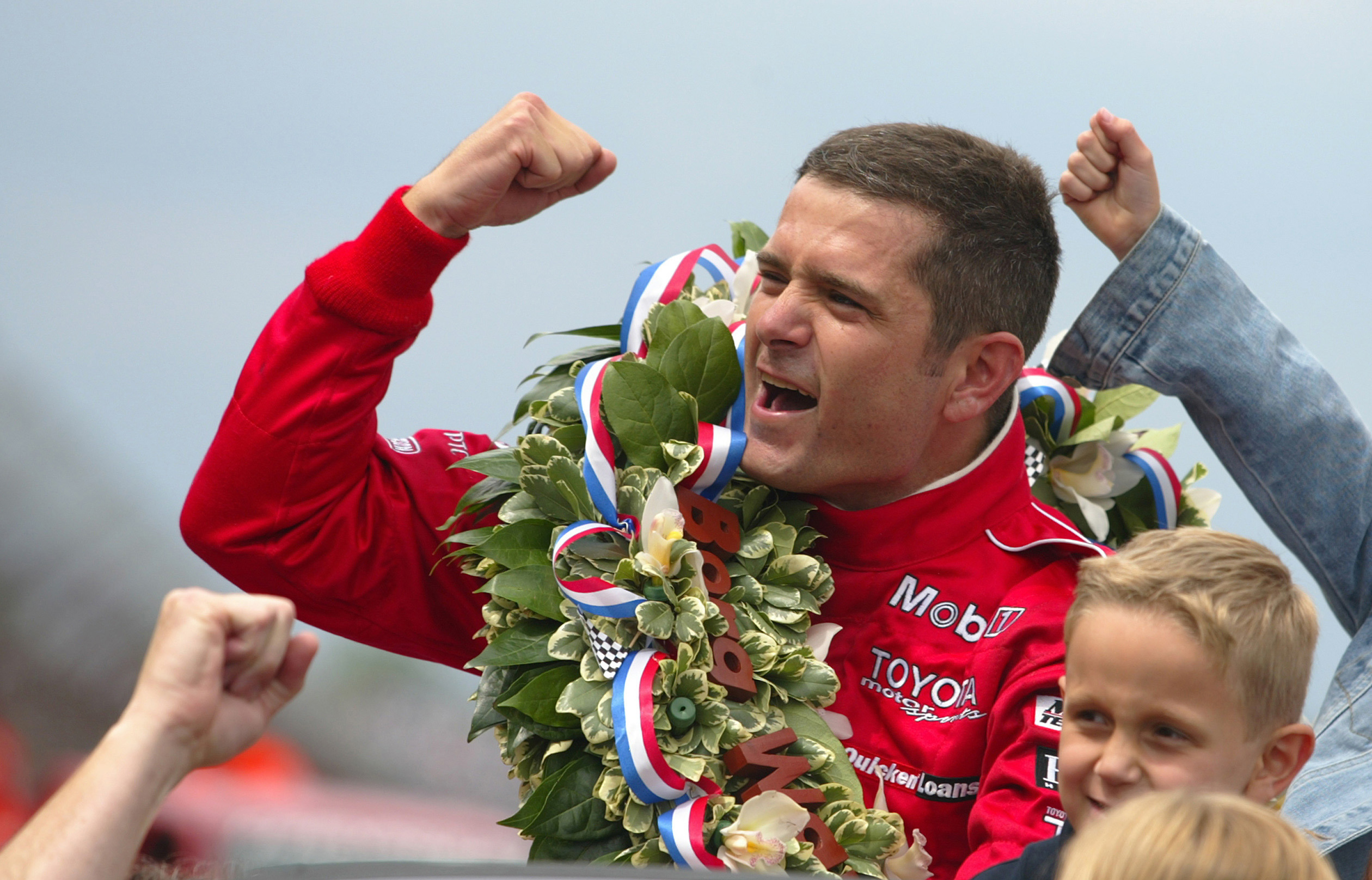 Gil de Ferran, driver of the  #6 Marlboro Team Penske Dallara Toyota, celebrates after winning the Indianapolis 500, part of the IRL (Indy Racing League) IndyCar Series, on May 25, 2003 at Indianapolis Motor Speedway in Indianapolis, Indiana.  (Photo by Donald Miralle/Getty Images)