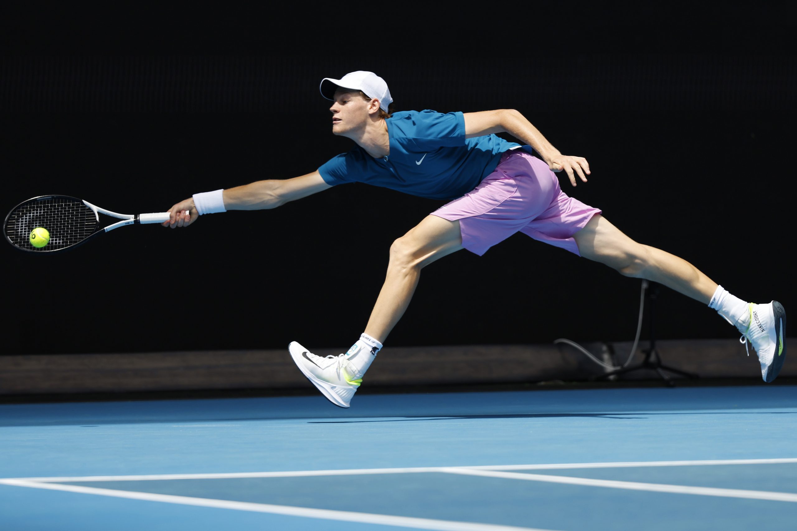 Jannik Sinner of Italy plays a forehand in their round one singles match against Kyle Edmund of Great Britain during day one of the 2023 Australian Open at Melbourne Park on January 16, 2023 in Melbourne, Australia. (Photo by Darrian Traynor/Getty Images)