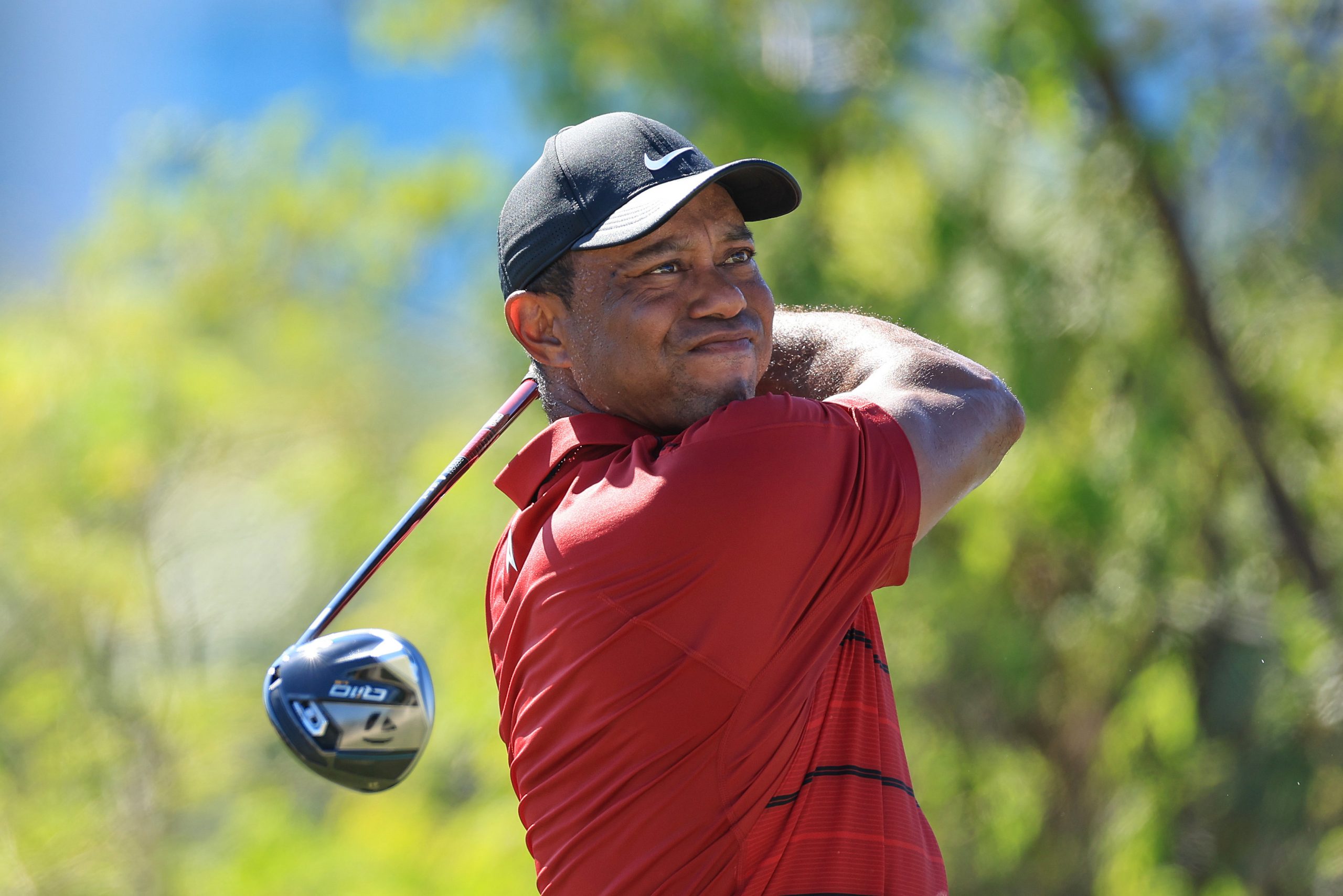 Tiger Woods plays his tee shot on the third hole during the final round of the Hero World Challenge.