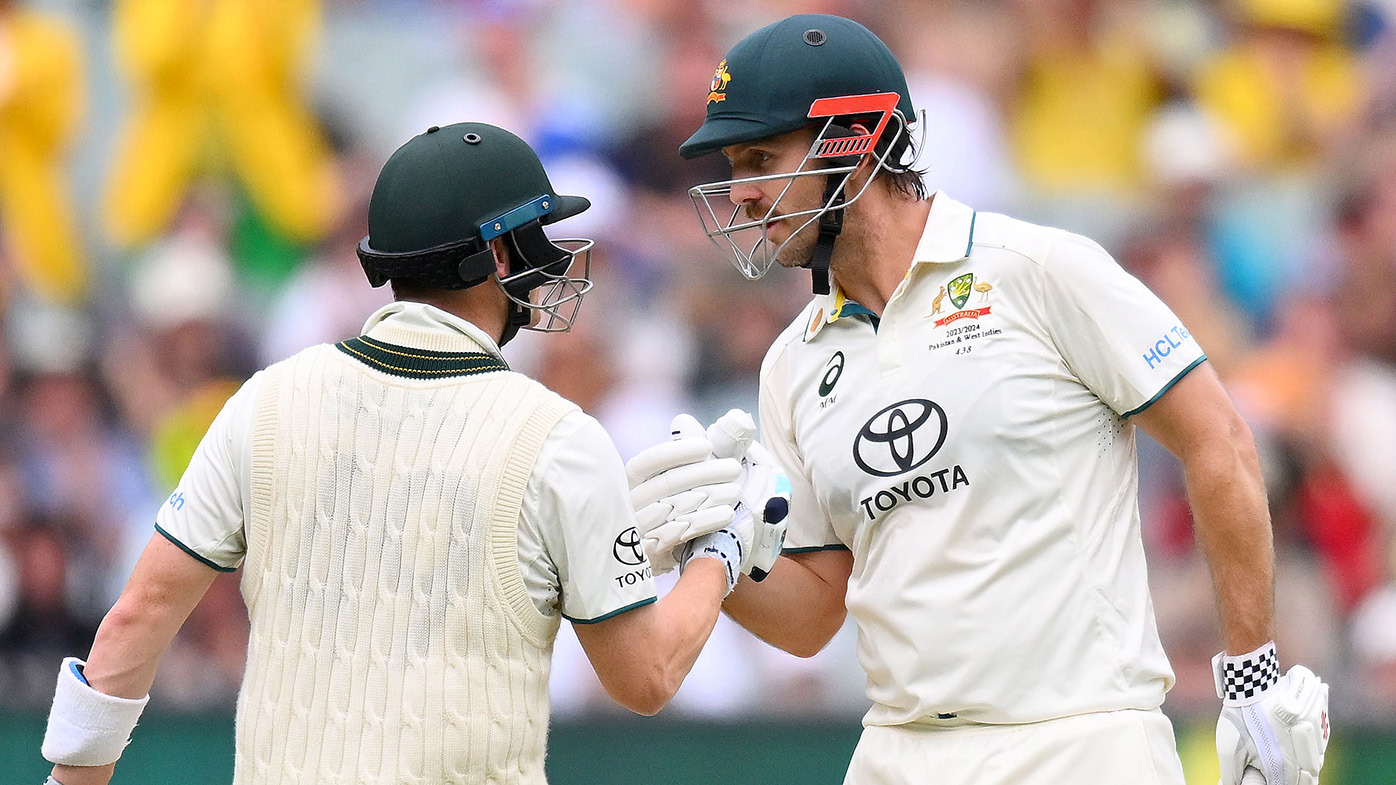 Steve Smith of Australia congratulates Mitch Marsh of Australia on scoring a half century during day three of the Second Test Match between Australia and Pakistan at Melbourne Cricket Ground on December 28, 2023 in Melbourne, Australia. (Photo by Morgan Hancock - CA/Cricket Australia via Getty Images)