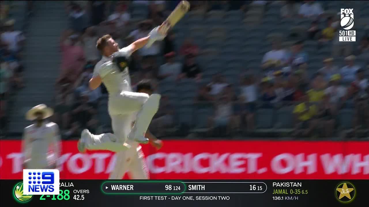 Opening-day Warner ton propels Aussies