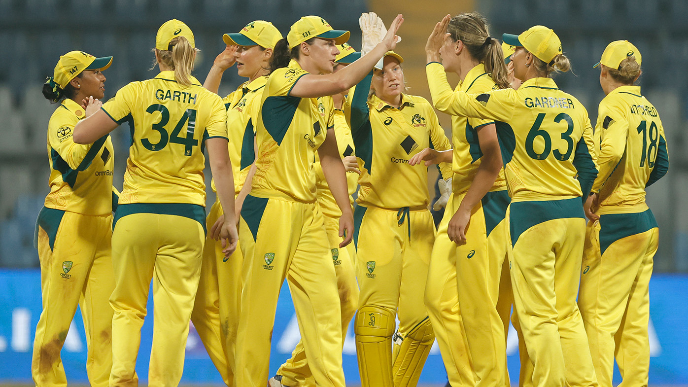 Australia celebrate their team's win over India during women's One Day International Match between India and Australia at Wankhede Stadium on December 30, 2023 in Mumbai, India. (Photo by Pankaj Nangia/Getty Images)