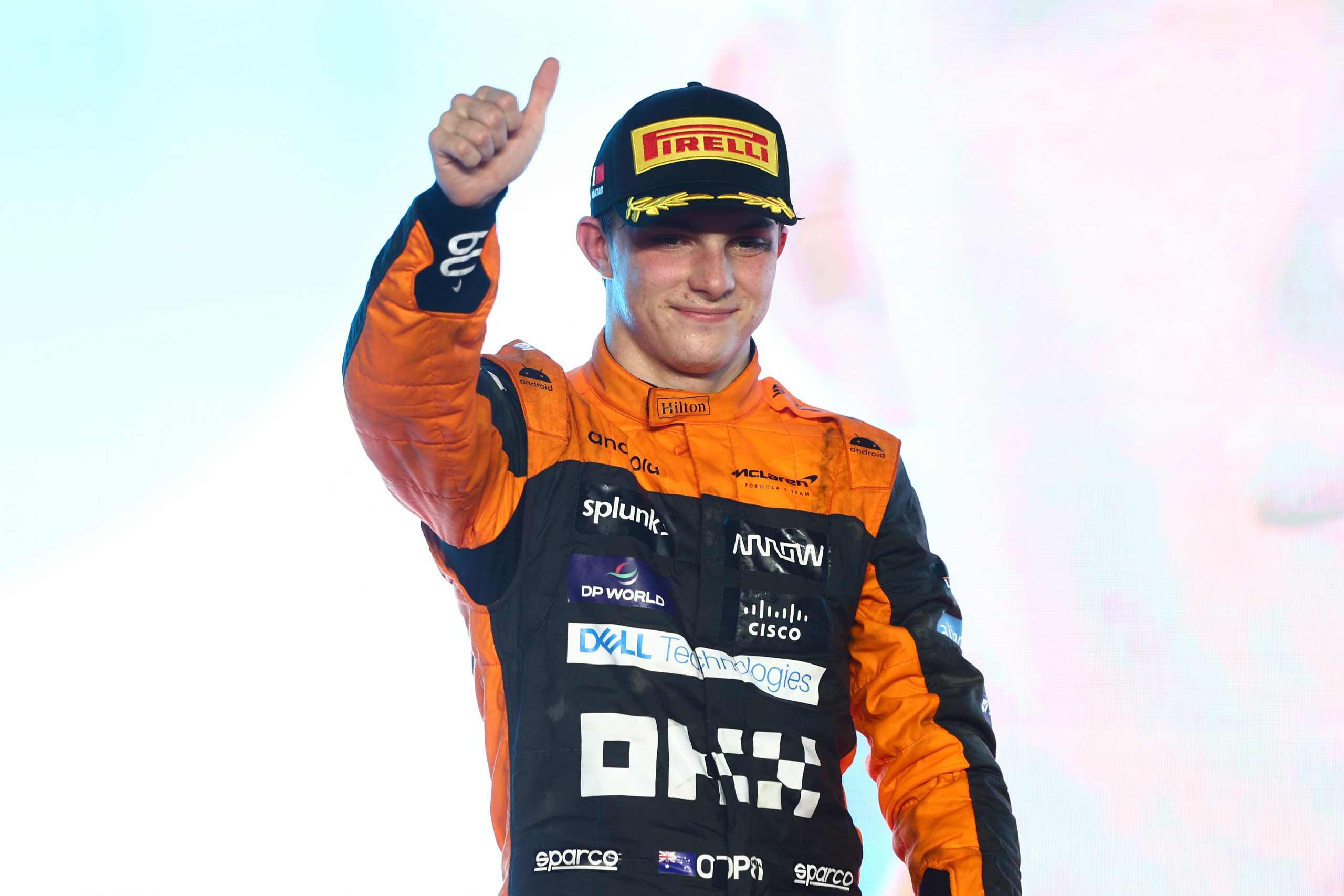 Second placed Oscar Piastri of Australia and McLaren celebrates on the podium during the F1 Grand Prix of Qatar at Lusail International Circuit on October 08, 2023 in Lusail City, Qatar. (Photo by Clive Rose/Getty Images)