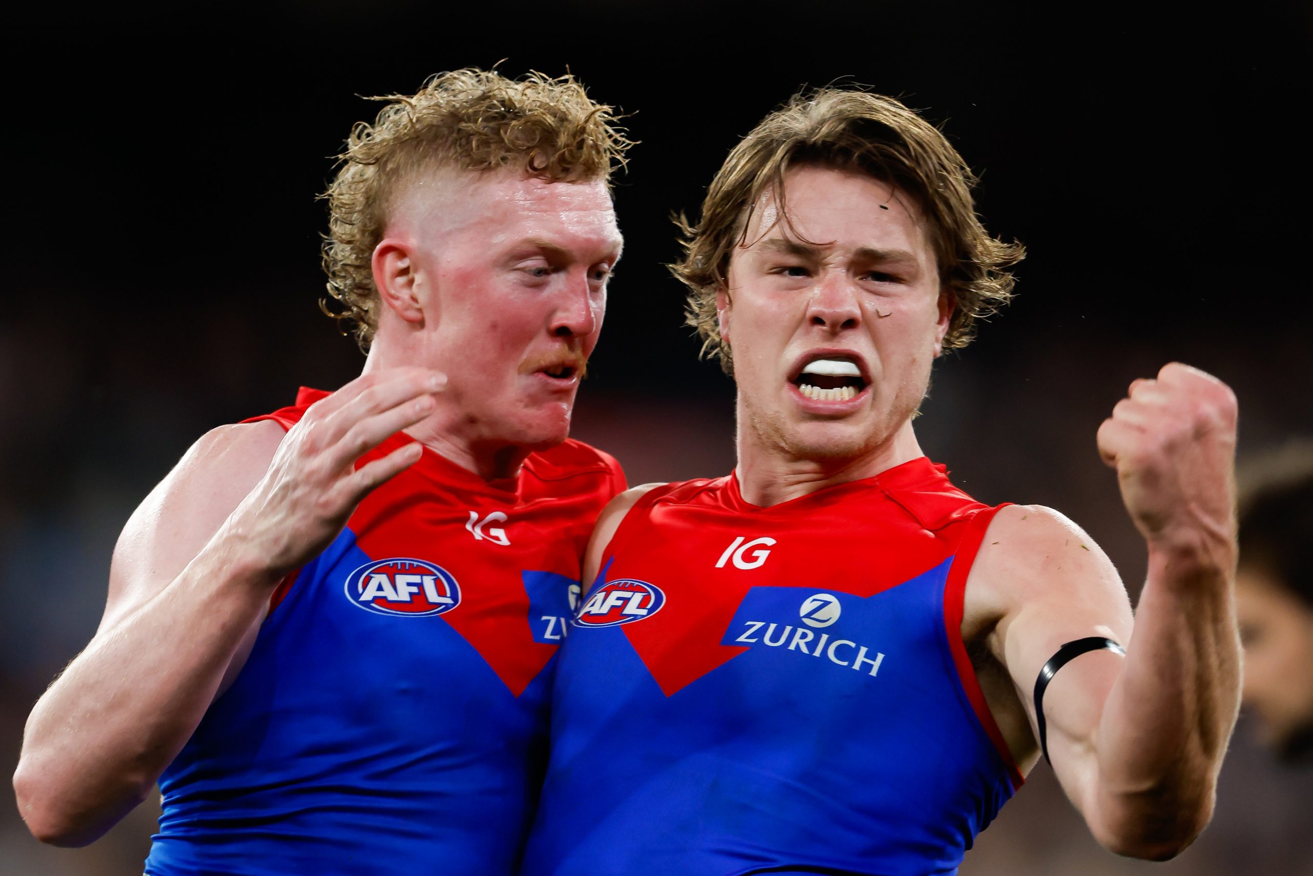 MELBOURNE, AUSTRALIA - SEPTEMBER 07: Tom Sparrow of the Demons celebrates a goal with Clayton Oliver of the Demons during the 2023 AFL First Qualifying Final match between the Collingwood Magpies and the Melbourne Demons at Melbourne Cricket Ground on September 07, 2023 in Melbourne, Australia. (Photo by Dylan Burns/AFL Photos via Getty Images)