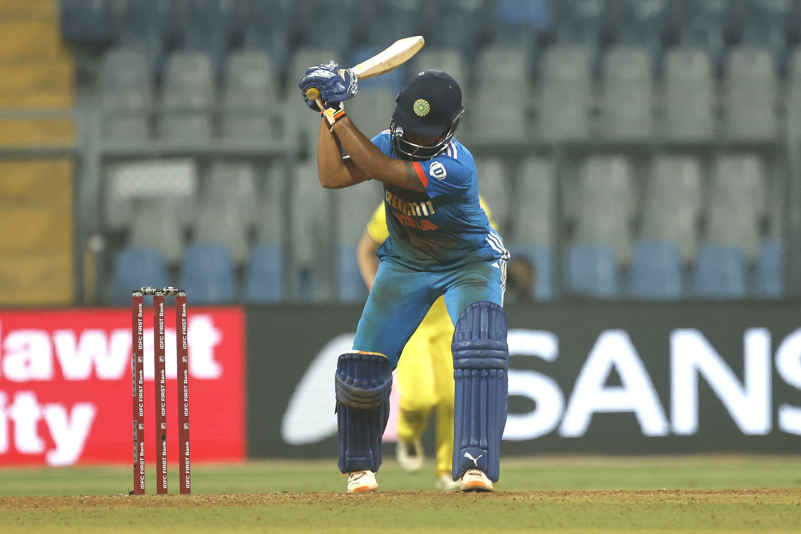 Richa Ghosh of India reacts after being dismissed during women's One Day International Match between India and Australia at Wankhede Stadium on December 30, 2023 in Mumbai, India. (Photo by Pankaj Nangia/Getty Images)