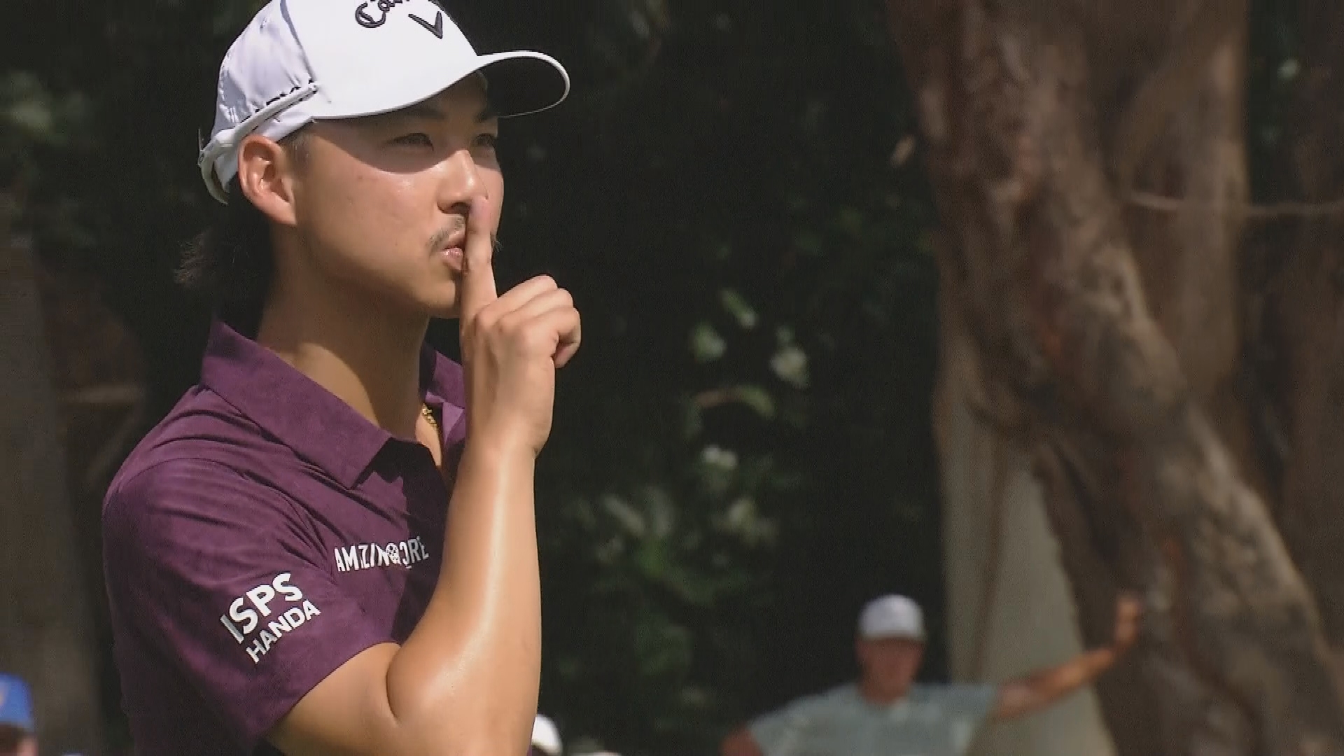 Min Woo Lee made a shushing motion after a commentator's voice from a TV put him off over a crucial putt.