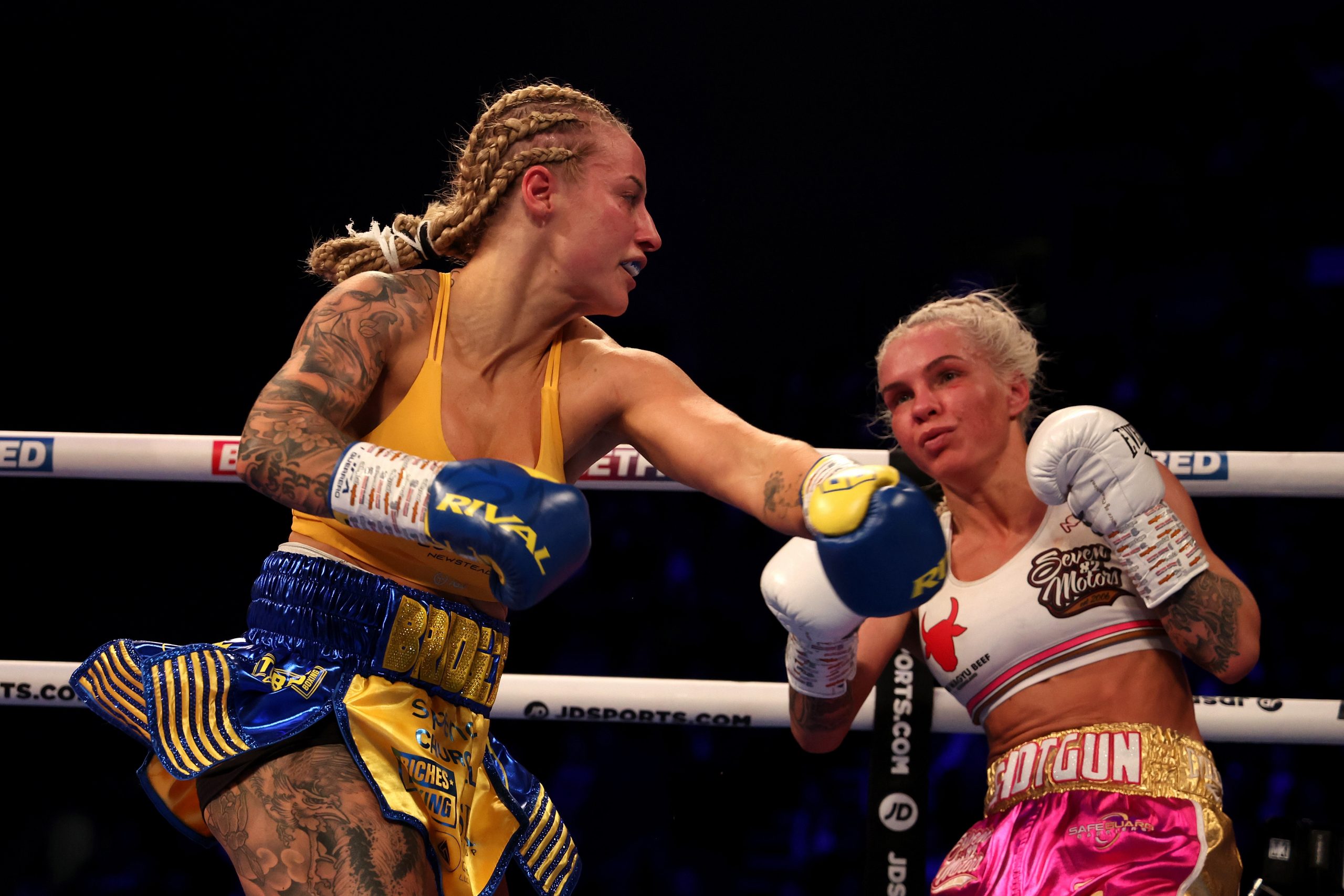 Ebanie Bridges and Shannon OConnell exchange blows during their IBF Women's World Bantamweight title fight at First Direct Arena in Leeds. (Photo by Nigel Roddis/Getty Images)