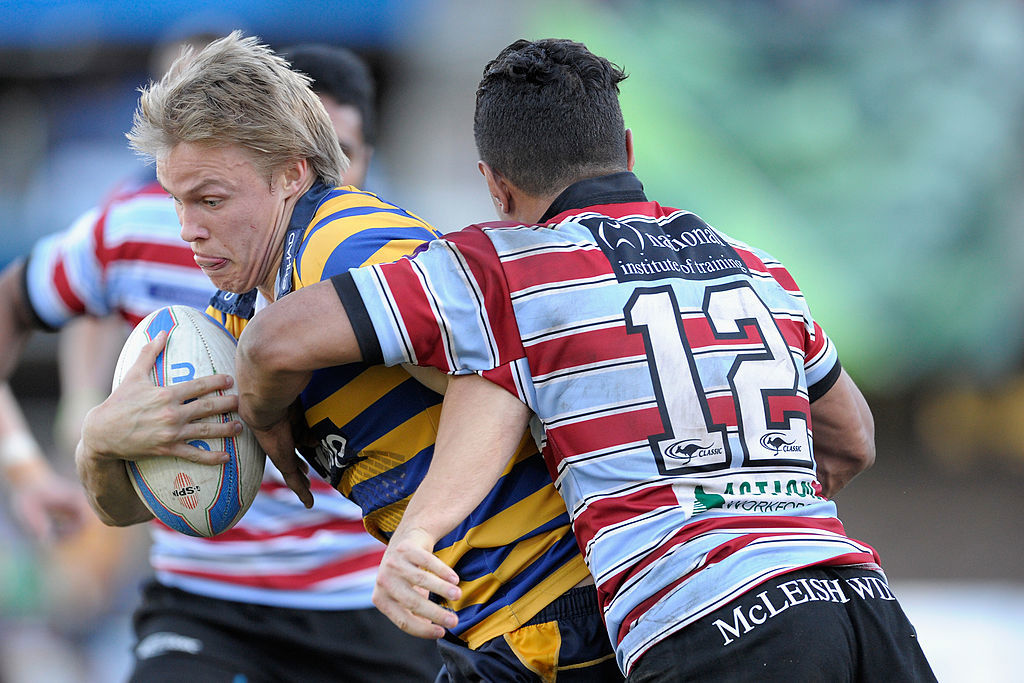 Tom Kingston in action for Sydney Uni at North Sydney Oval in 2013.