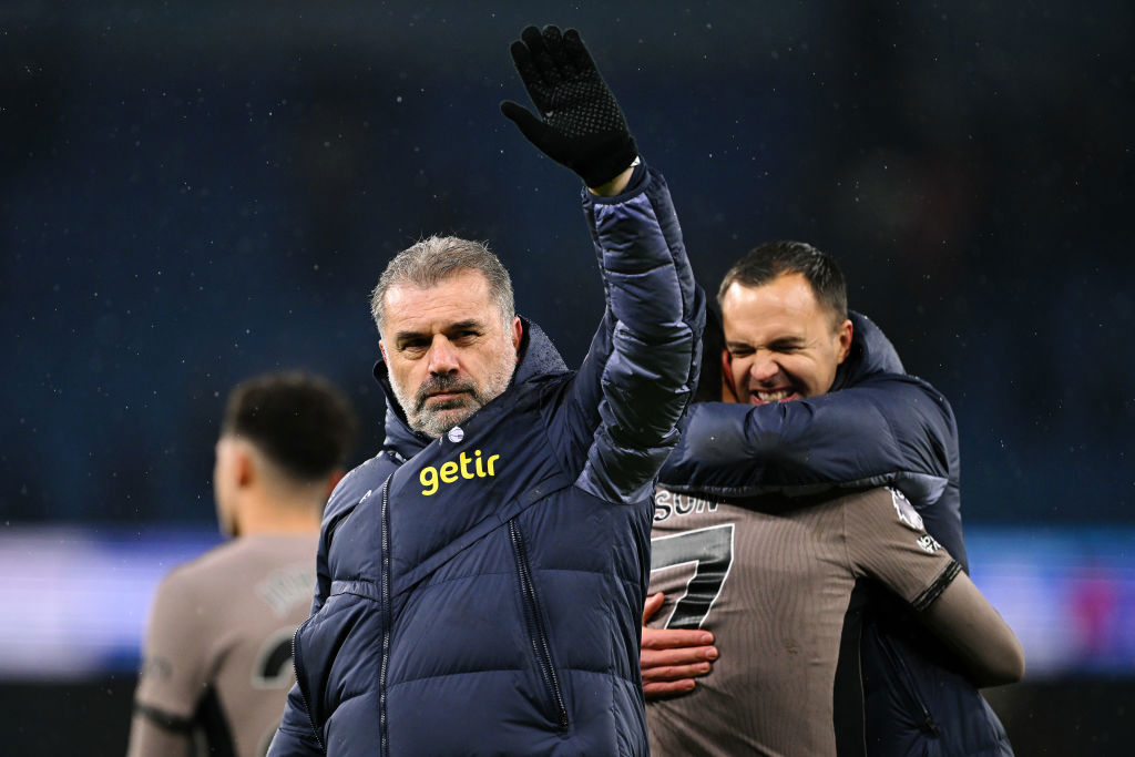 Ange Postecoglou acknowledges the fans at Etihad Stadium.