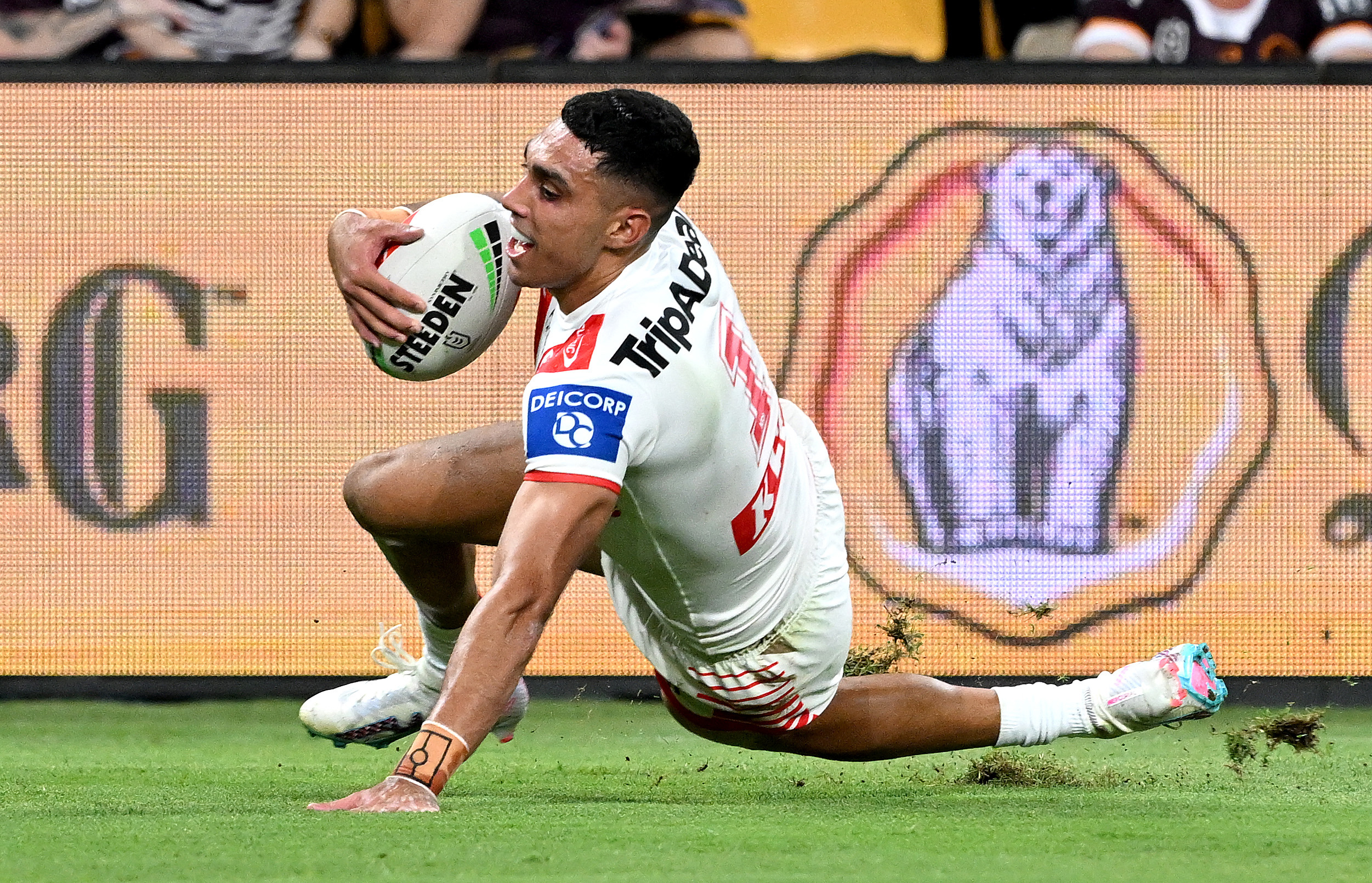 Tyrell Sloan of the Dragons scores a try during the round three NRL match between Brisbane Broncos and St George Illawarra Dragons at Suncorp Stadium on March 18, 2023 in Brisbane, Australia. (Photo by Bradley Kanaris/Getty Images)