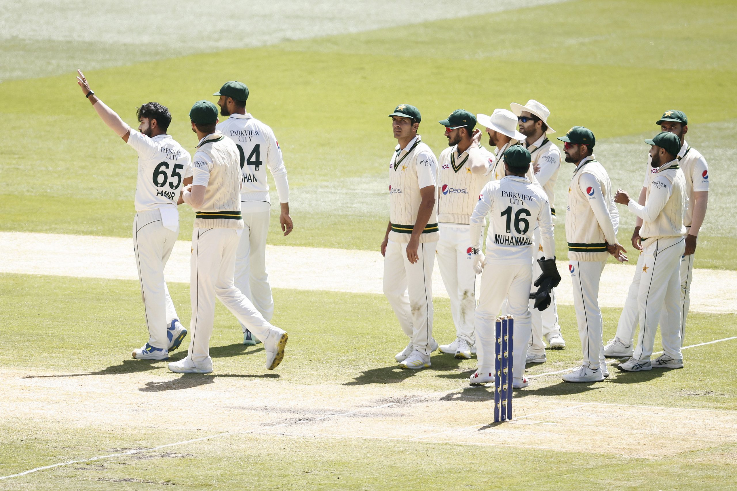 Aamir Jamal of Pakistan celebrates the dismissal of Pat Cummins of Australia during day four of the Second Test Match between Australia and Pakistan at Melbourne Cricket Ground on December 29, 2023 in Melbourne, Australia. (Photo by Daniel Pockett - CA/Cricket Australia via Getty Images)