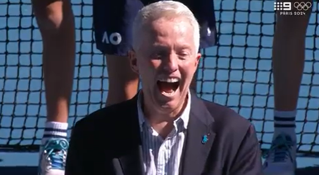 Tennis Australia CEO Craig Tiley couldn't hide his laughter after the pair forget their trophy.