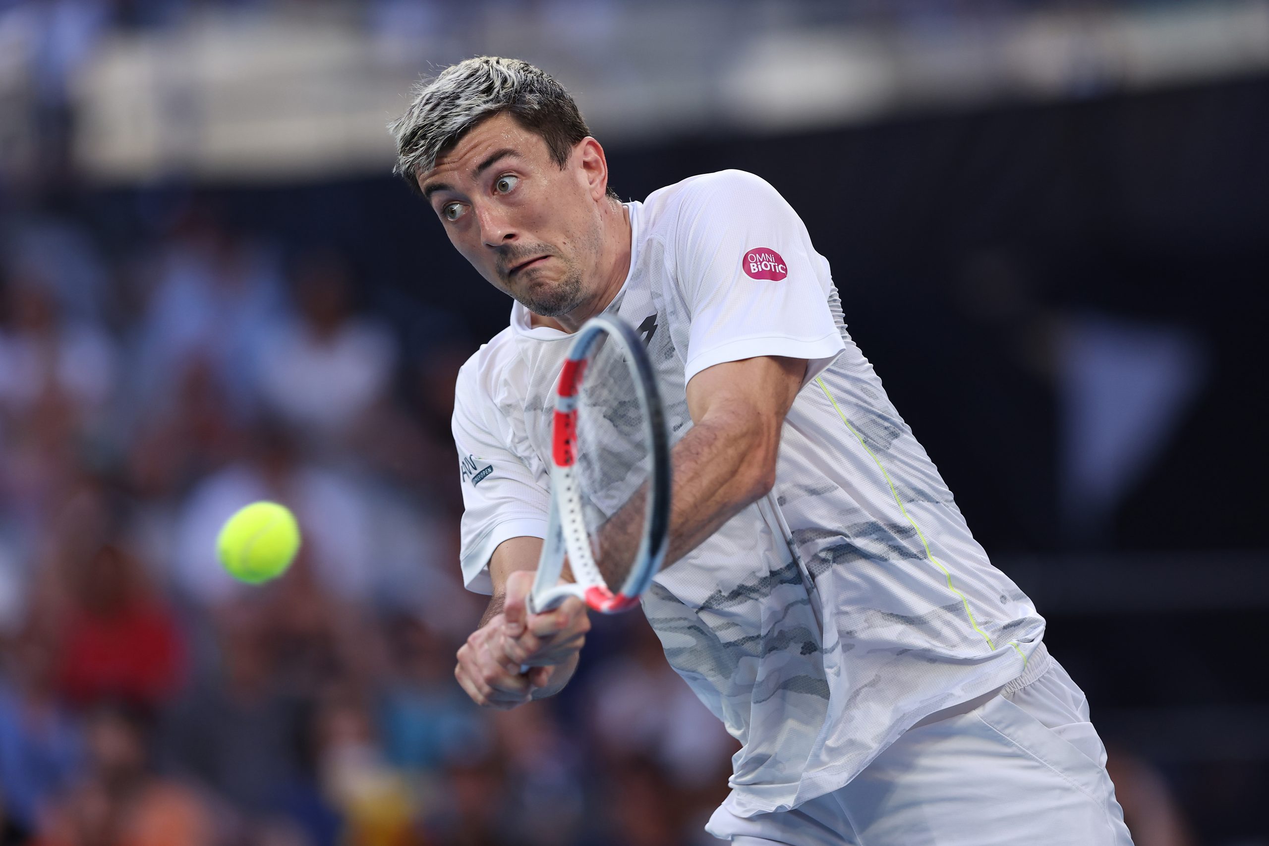 Sebastian Ofner of Austria plays a backhand in their round one singles match against Thanasi Kokkinakis of Australia during the 2024 Australian Open at Melbourne Park on January 16, 2024 in Melbourne, Australia. (Photo by Phil Walter/Getty Images)