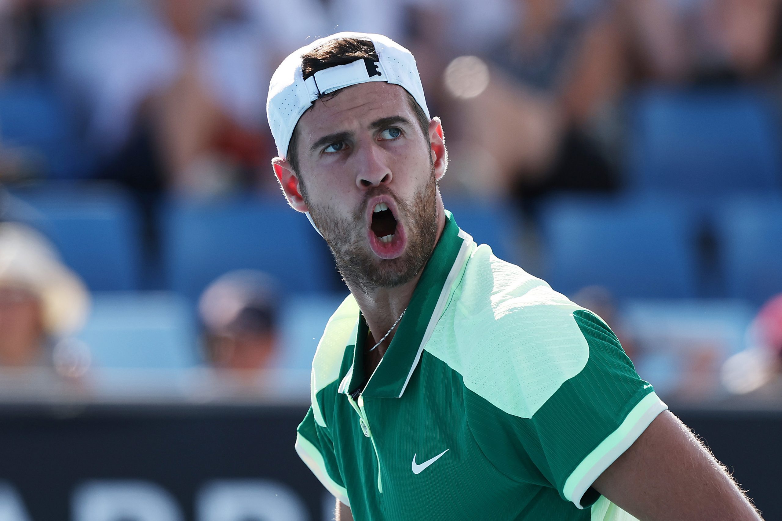 MELBOURNE, AUSTRALIA - JANUARY 15: Karen Khachanov reacts in their round one singles match against Daniel Altmaier of Germany during the 2024 Australian Open at Melbourne Park on January 15, 2024 in Melbourne, Australia. (Photo by Darrian Traynor/Getty Images)