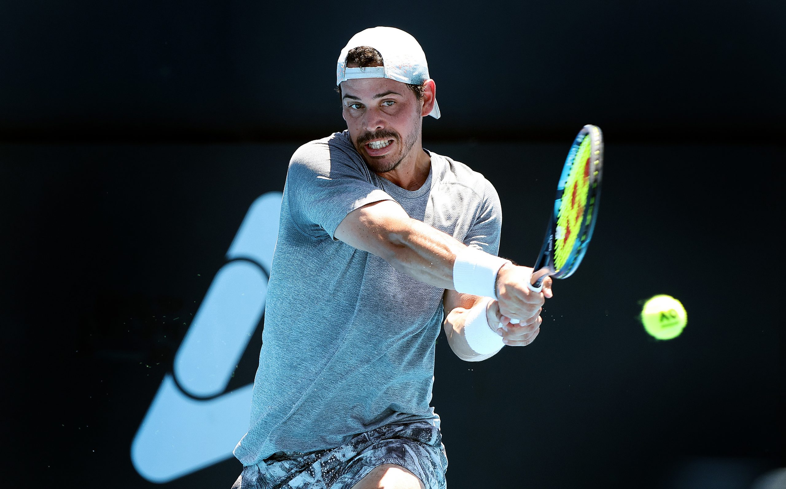 Alex Bolt of Australia plays a background during their match against Thiago Seyboth Wild of Brazil  in the 2024 Adelaide International at Memorial Drive on January 09, 2024 in Adelaide, Australia. (Photo by Sarah Reed/Getty Images)