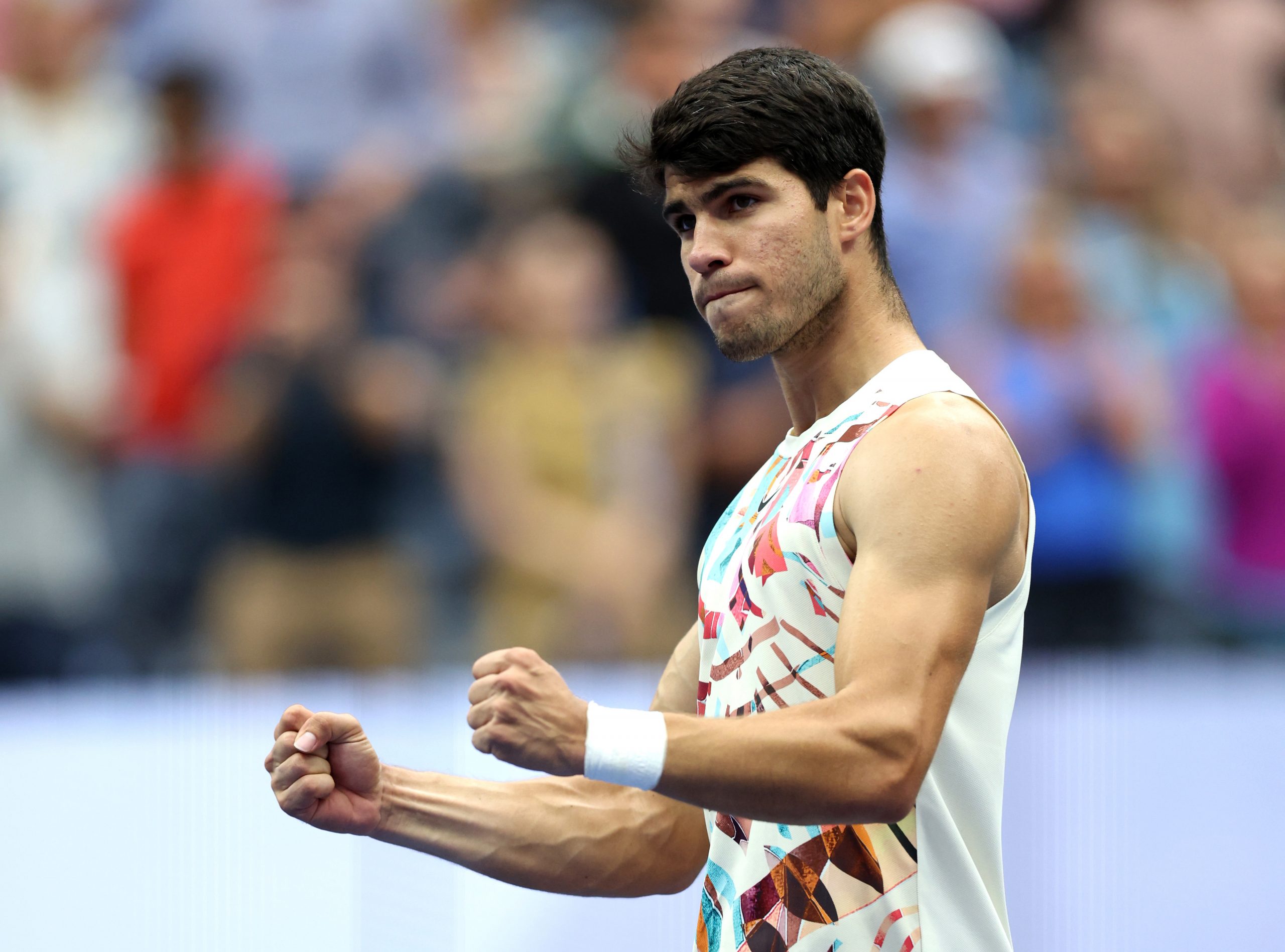 Carlos Alcaraz of Spain celebrates match point against Matteo Arnaldi of Italy during their Men's Singles Fourth Round match on Day Eight of the 2023 US Open at the USTA Billie Jean King National Tennis Center on September 04, 2023 in the Flushing neighborhood of the Queens borough of New York City.  (Photo by Clive Brunskill/Getty Images)