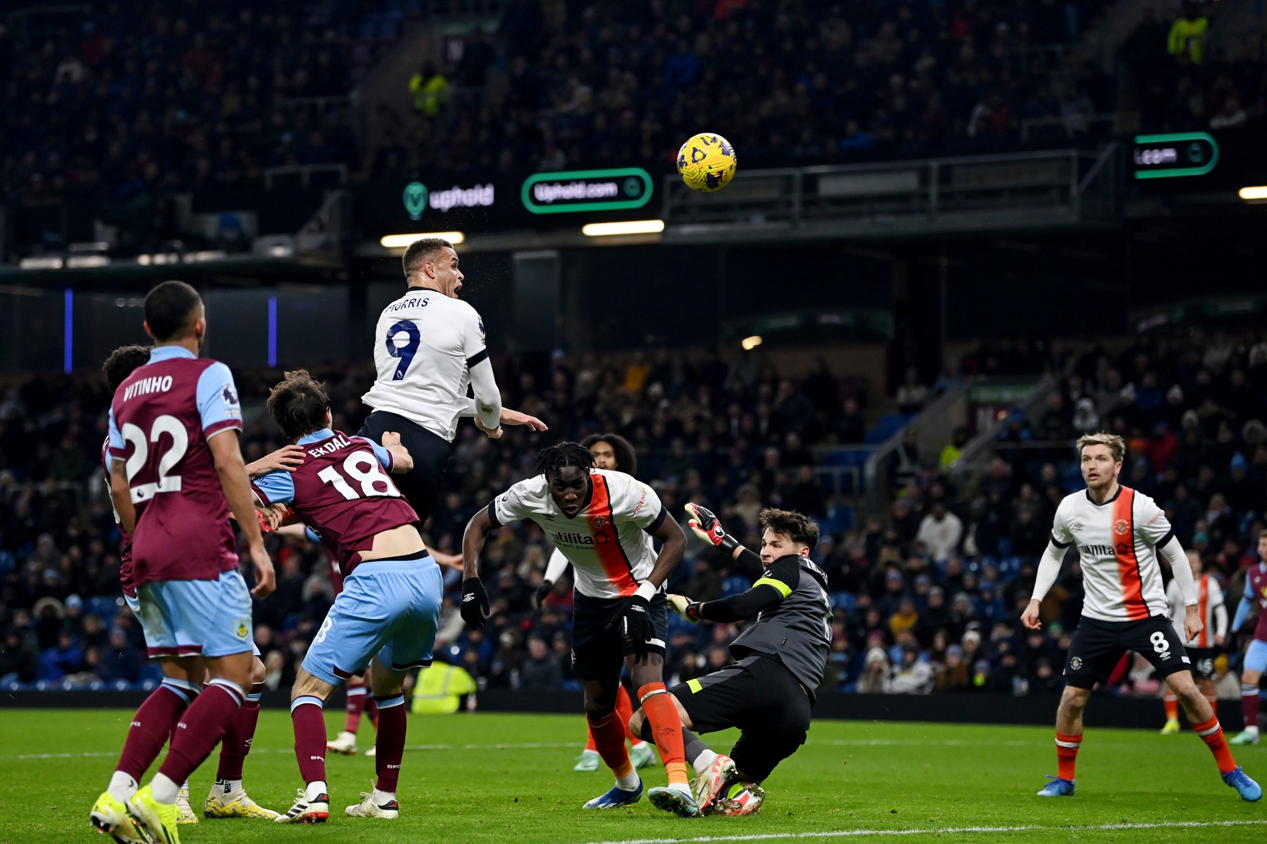 Carlton Morris of Luton Town scores his team's first goal during the Premier League match between Burnley FC and Luton Town at Turf Moor on January 12, 2024 in Burnley, England. (Photo by Gareth Copley/Getty Images)