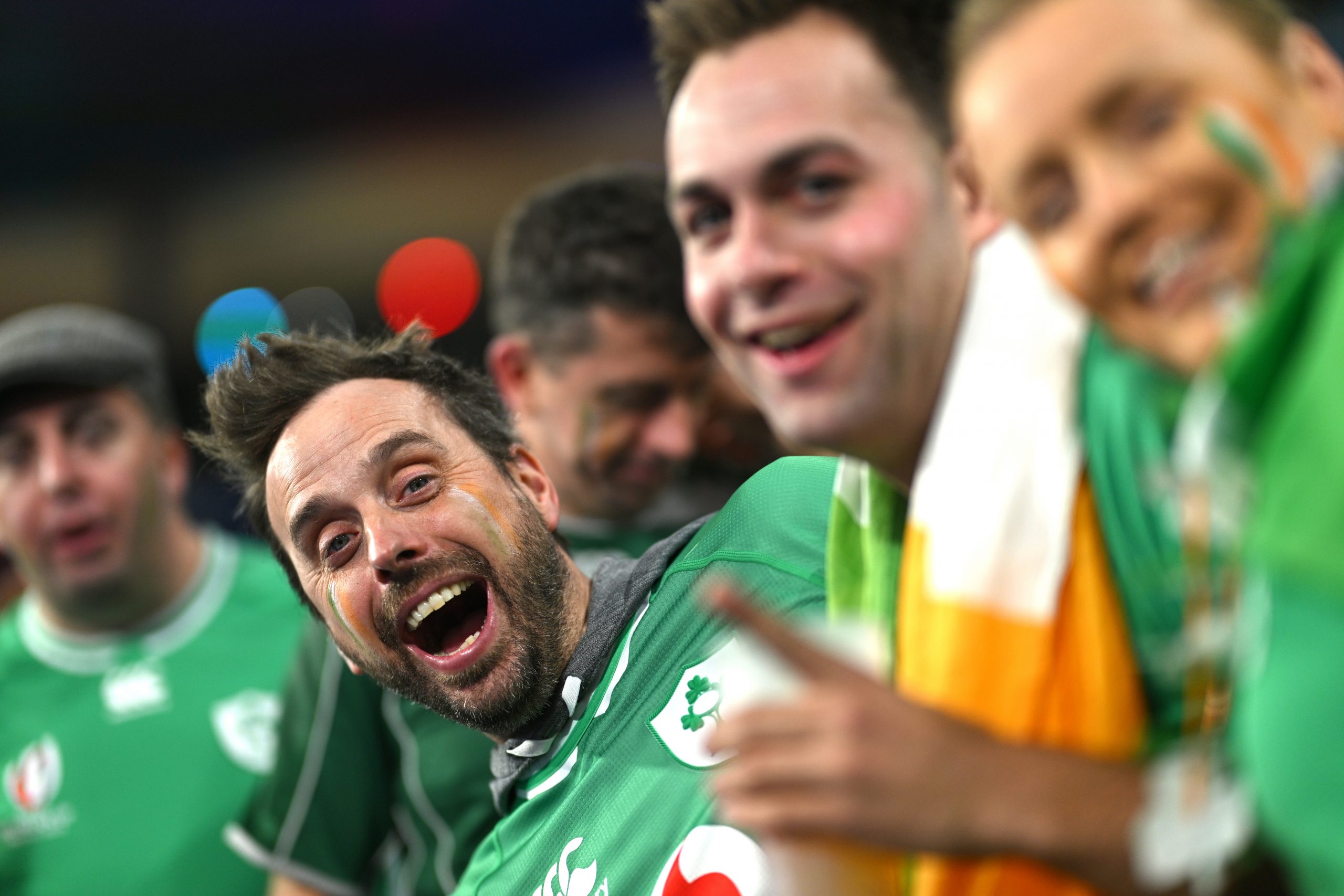 Fans of Ireland pose for a photo at Stade de France.