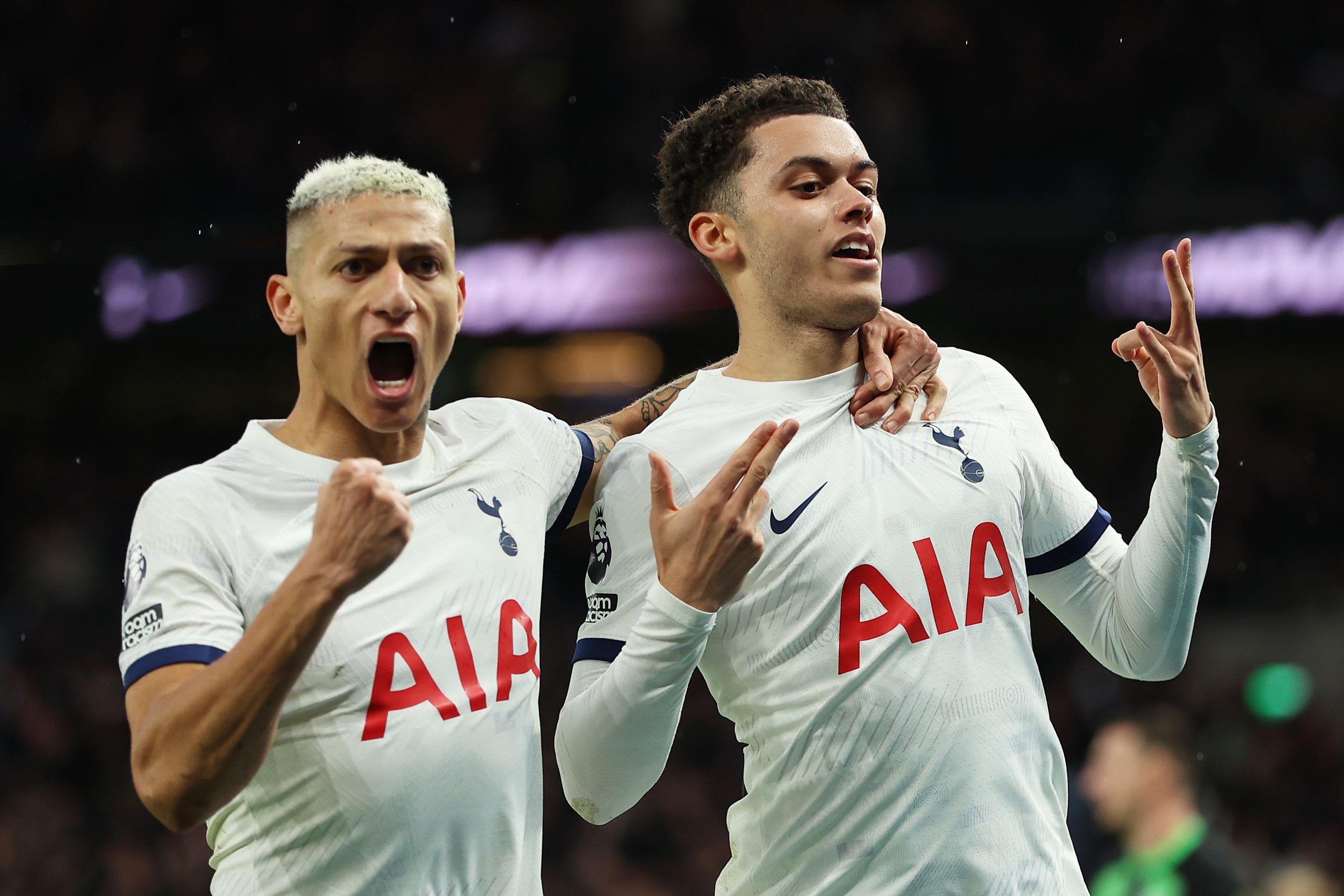 Brennan Johnson of Tottenham Hotspur celebrates with team mate Richarlison after scoring his team's second goal during the Premier League match between Tottenham Hotspur and Brighton & Hove Albion at Tottenham Hotspur Stadium on February 10, 2024 in London, England. (Photo by Richard Pelham/Getty Images)