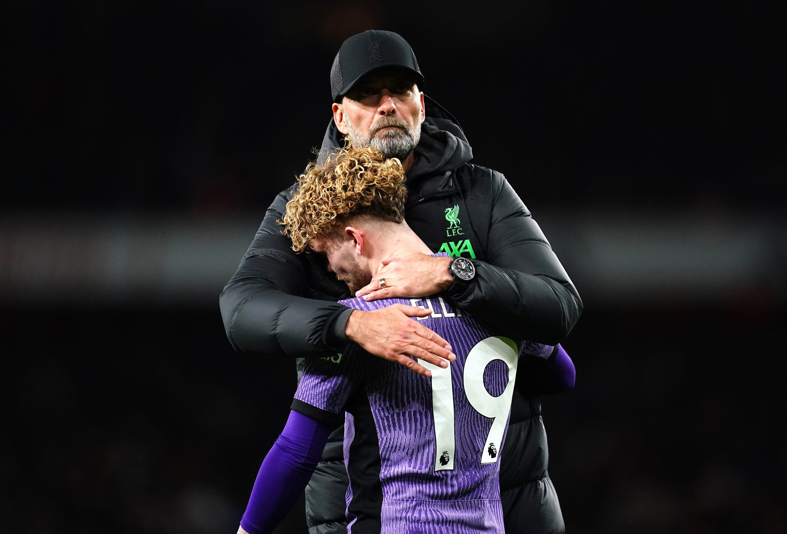 Liverpool manager Jurgen Klopp hugs Harvey Elliott.