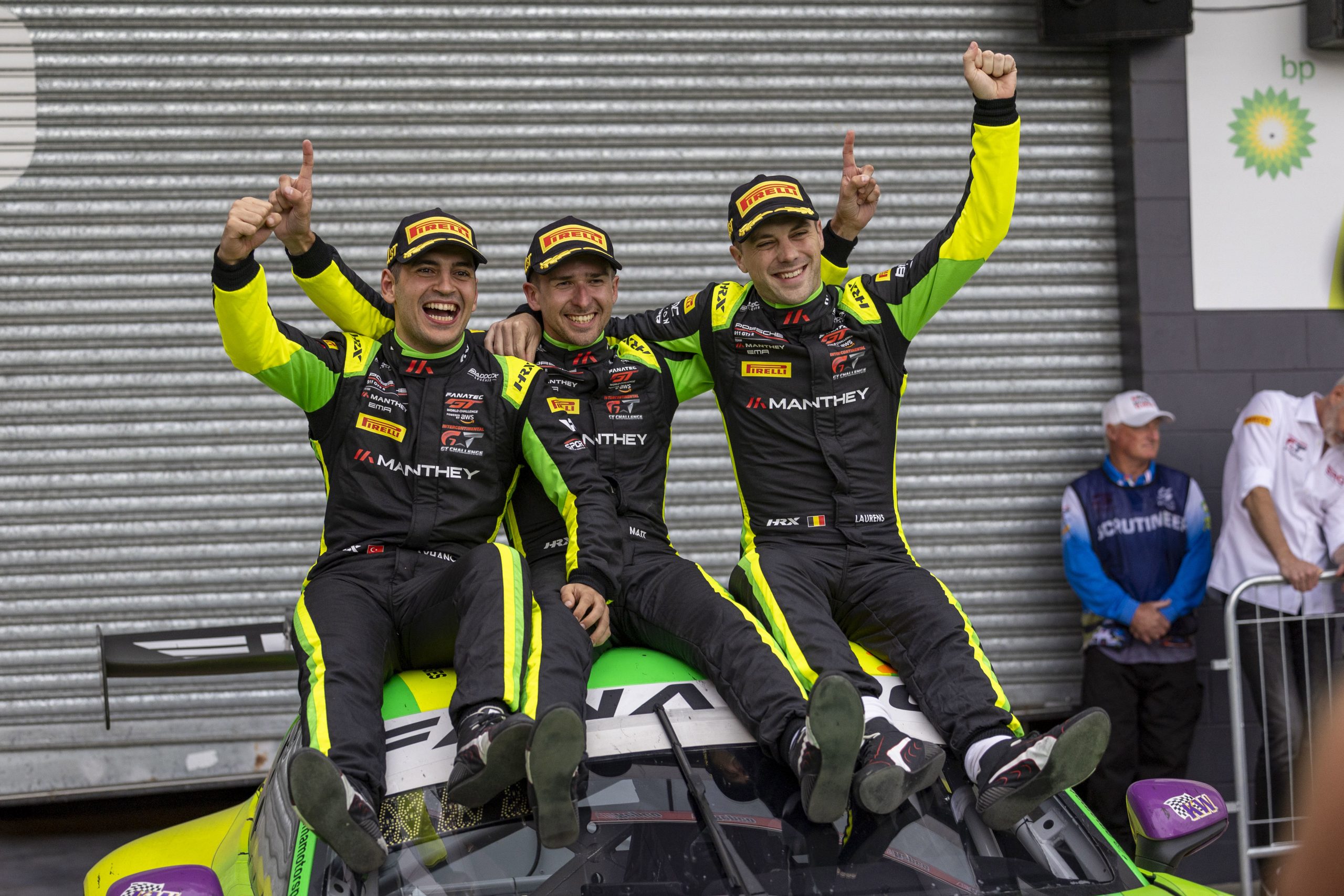 Ayhancan Guven, Matt Campbell and Laurens Vanthoor celebrating their win for Porsche in the 2024 Bathurst 12 hour.