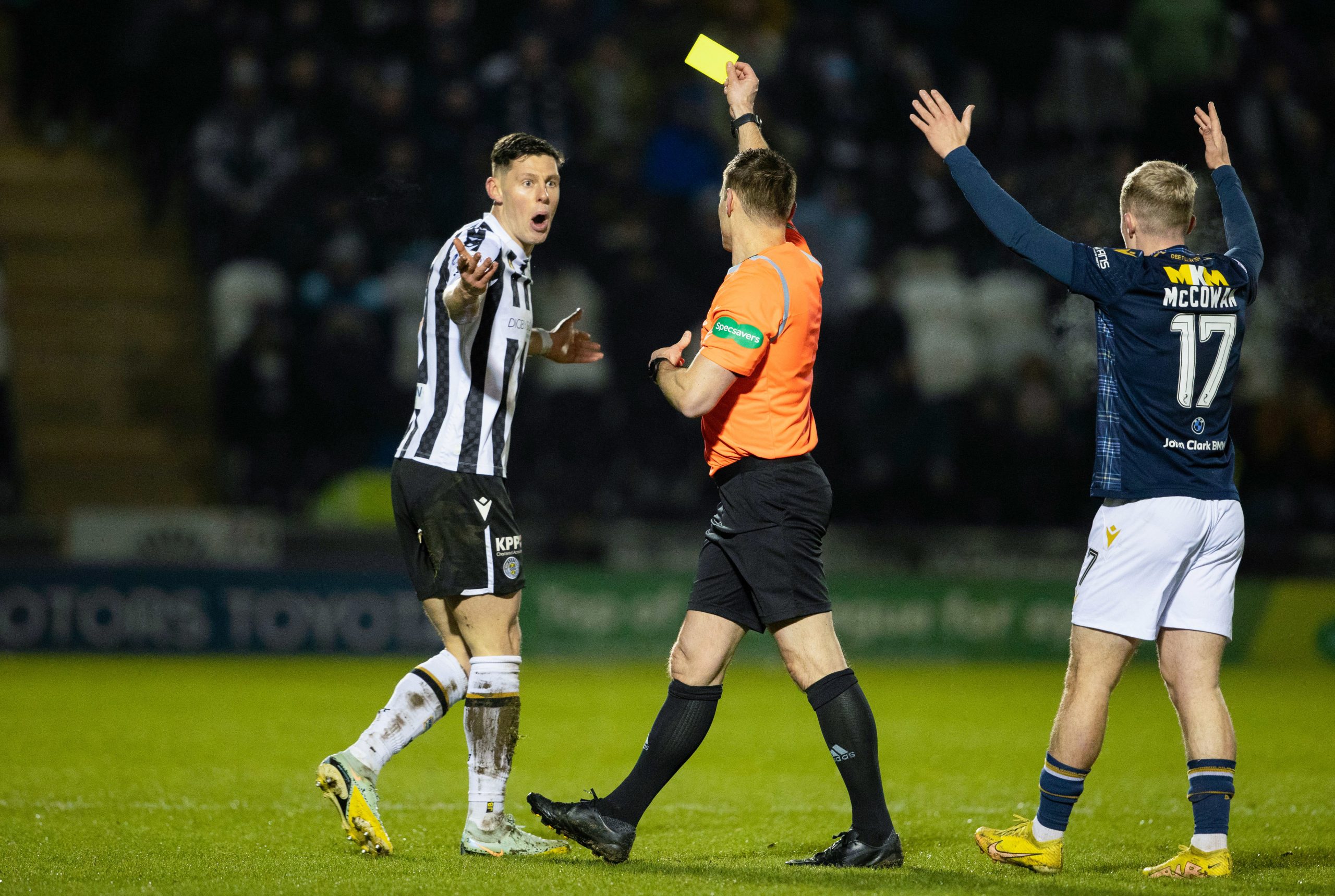 St Mirren's James Bolton is shown a yellow card during a cinch Premiership match between St Mirren and Dundee.