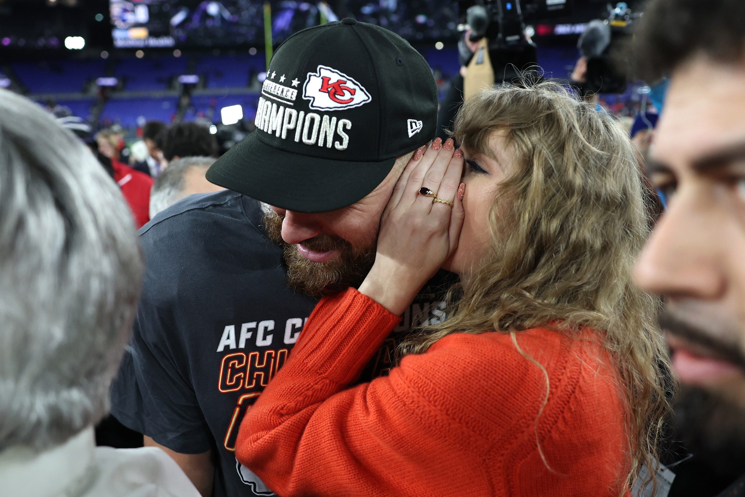 Taylor Swift and Travis Kelce after the Chiefs win at the AFC Championship Game.